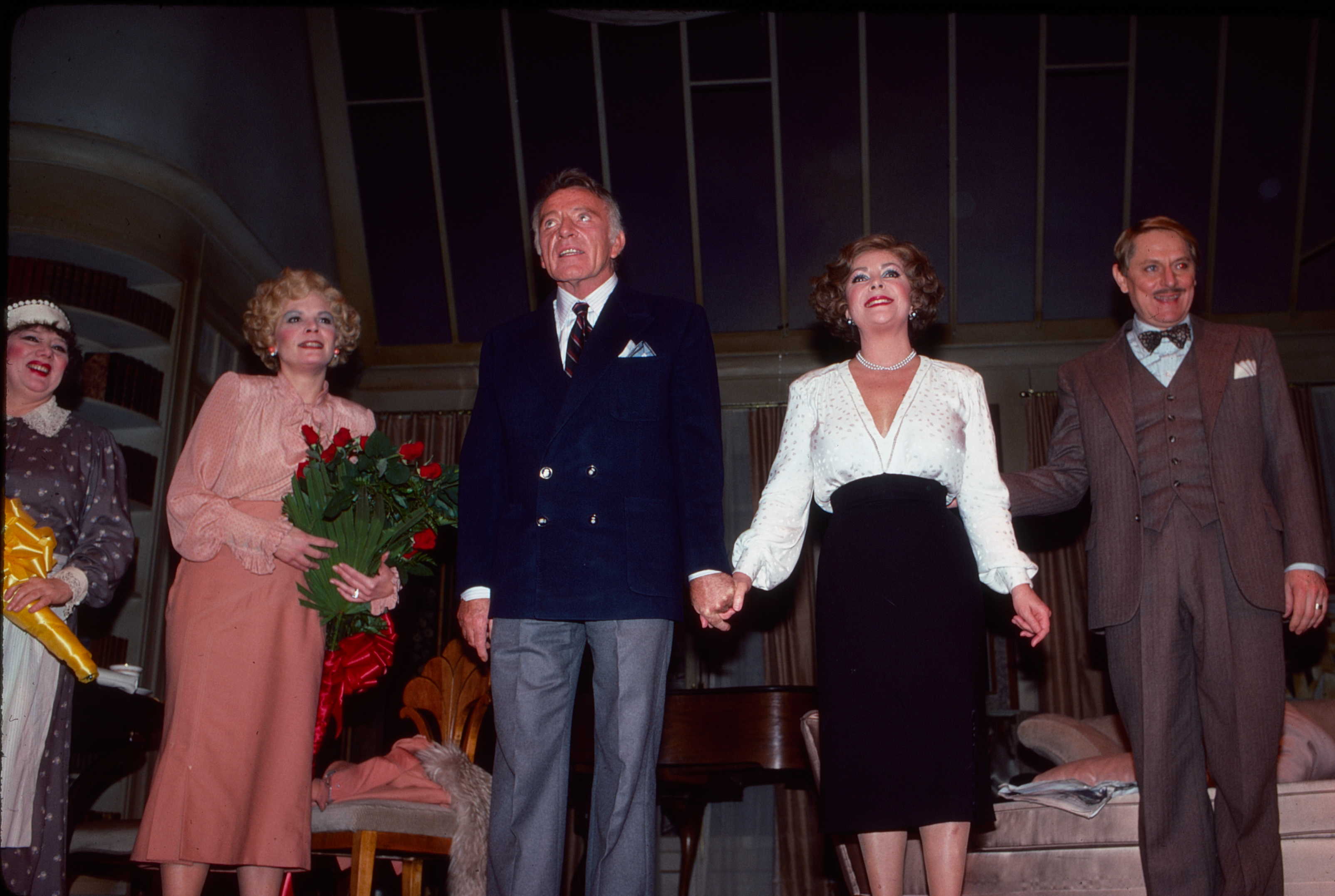 Richard Burton and Elizabeth Taylor with Kathryn Walker and John Cullum during a curtain call on the opening night of "Private Lives" at the Lunt Fontanne Theater on May 8, 1983, in New York. | Source: Getty Images