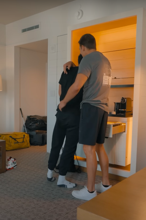 Tom and Benjamin Brady sharing an embrace. | Source: YouTube/Tom Brady