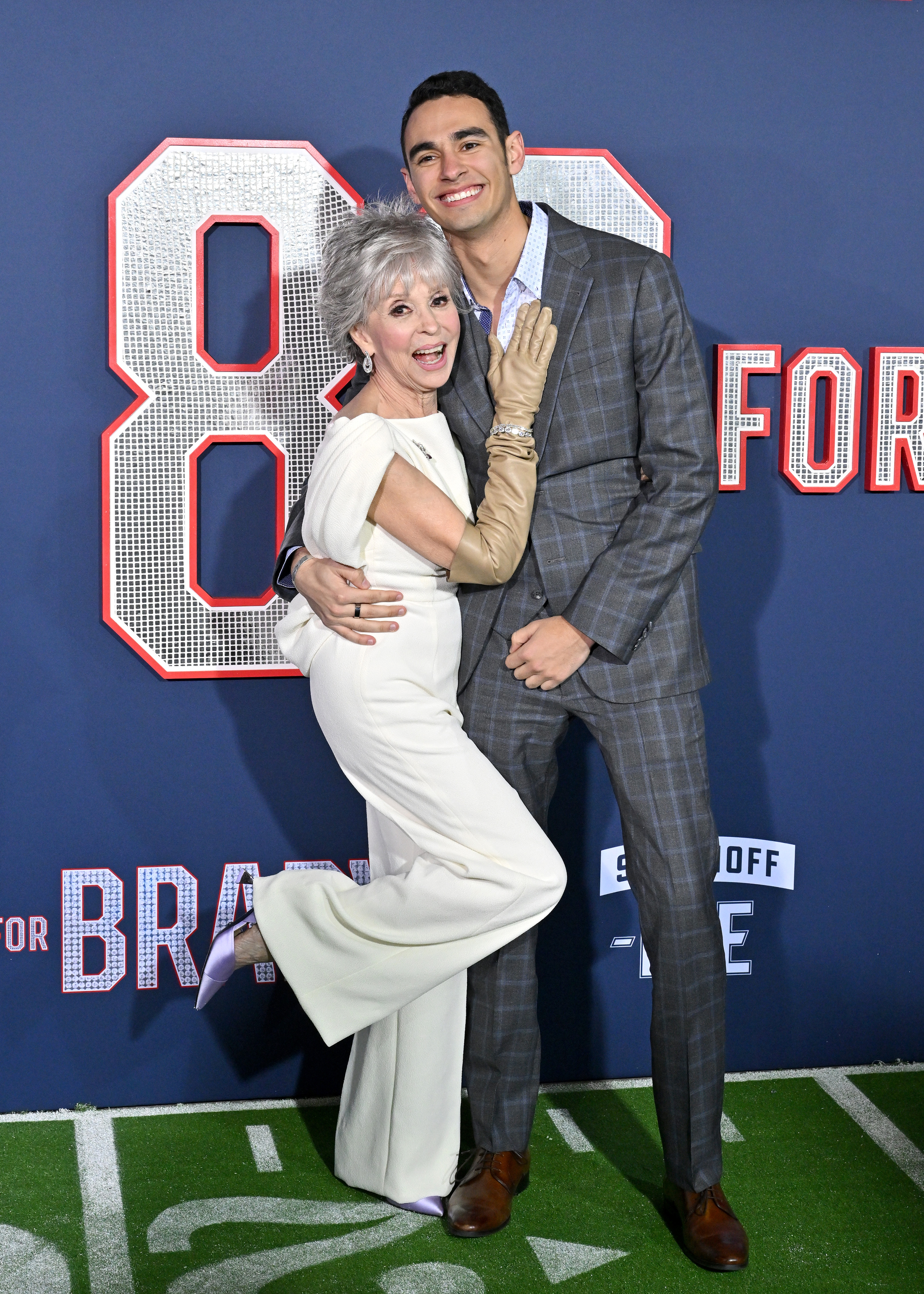 Rita Moreno and Justin Fisher attend the Los Angeles premiere screening of "80 For Brady" on January 31, 2023, in Los Angeles, California. | Source: Getty Images