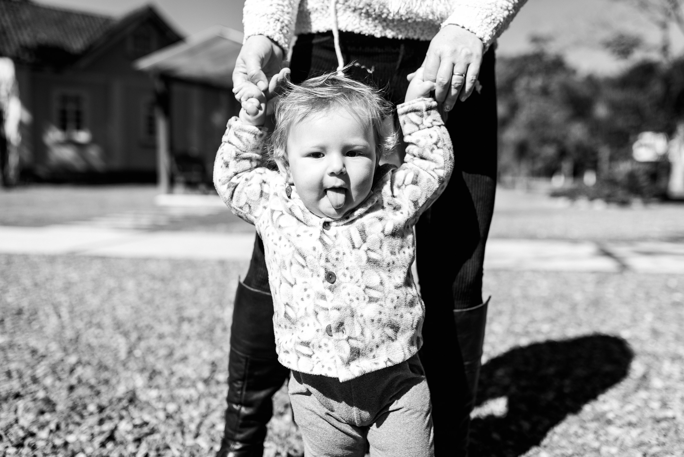 A person holding a baby's hands | Source: Unsplash