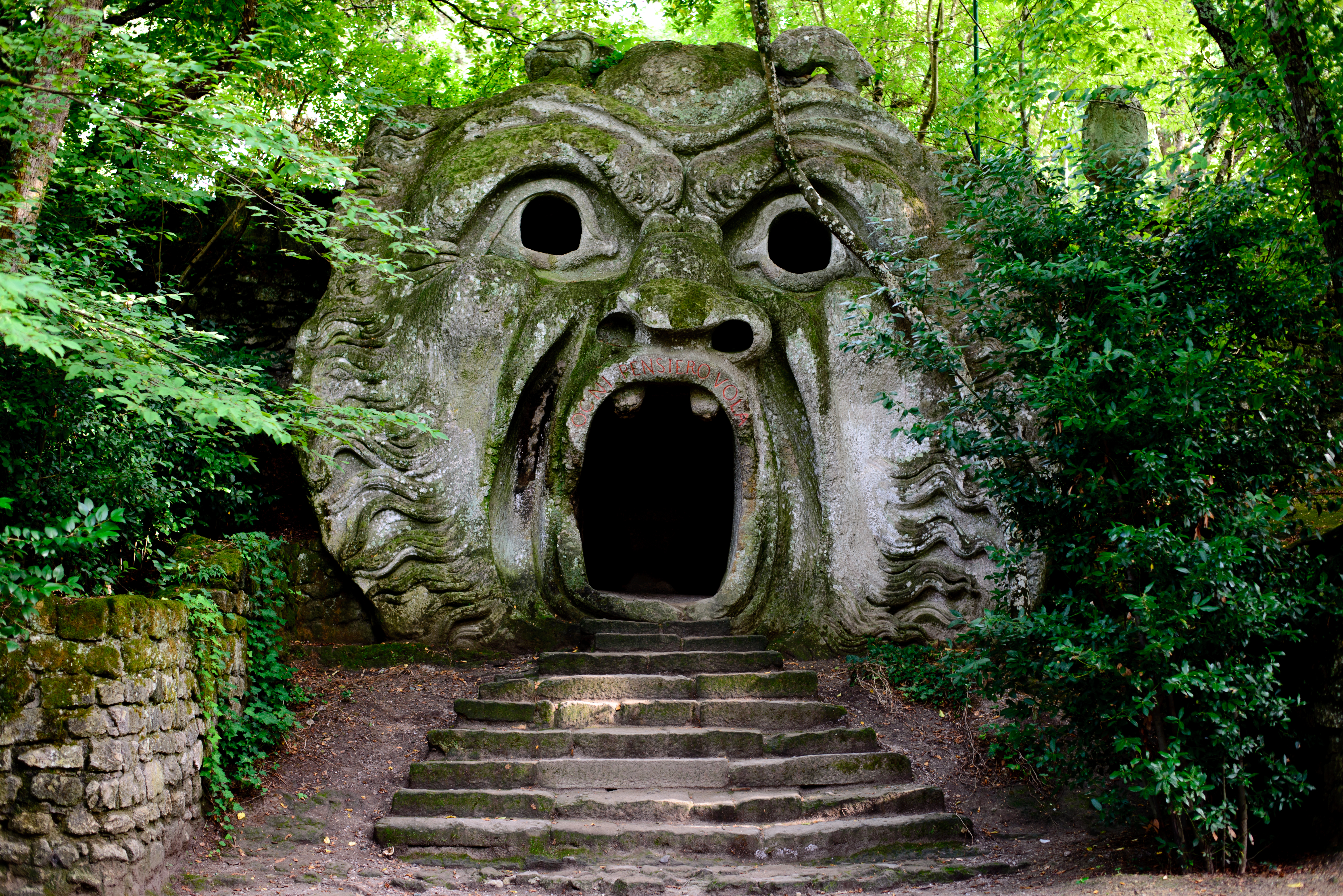 Cave entrance with rock shaped into a face | Source: Getty Images