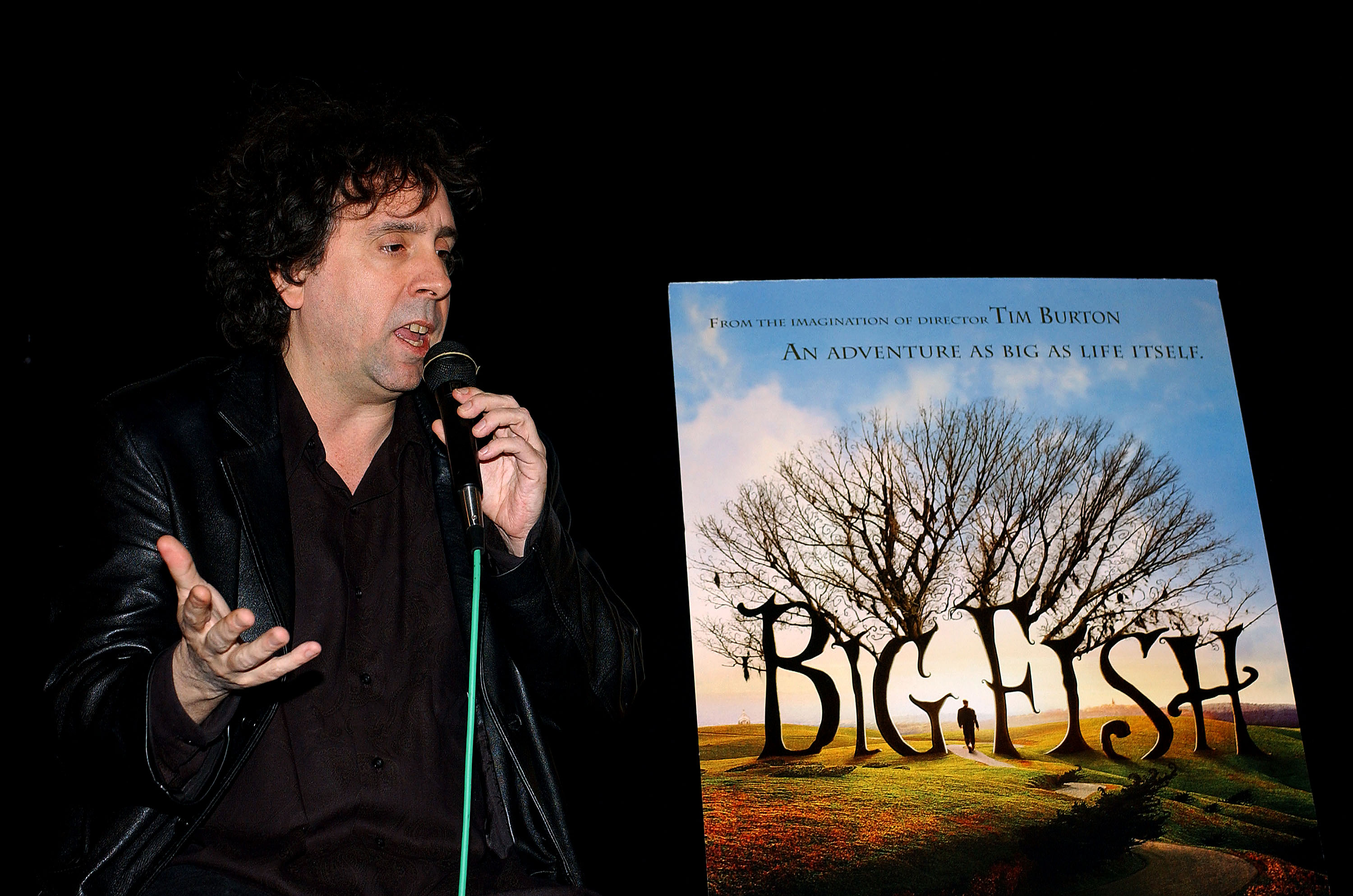 Tim Burton discusses his film "Big Fish" following a special sneak preview at The Egyptian Theatre on December 9, 2003, in Hollywood, California. | Source: Getty Images
