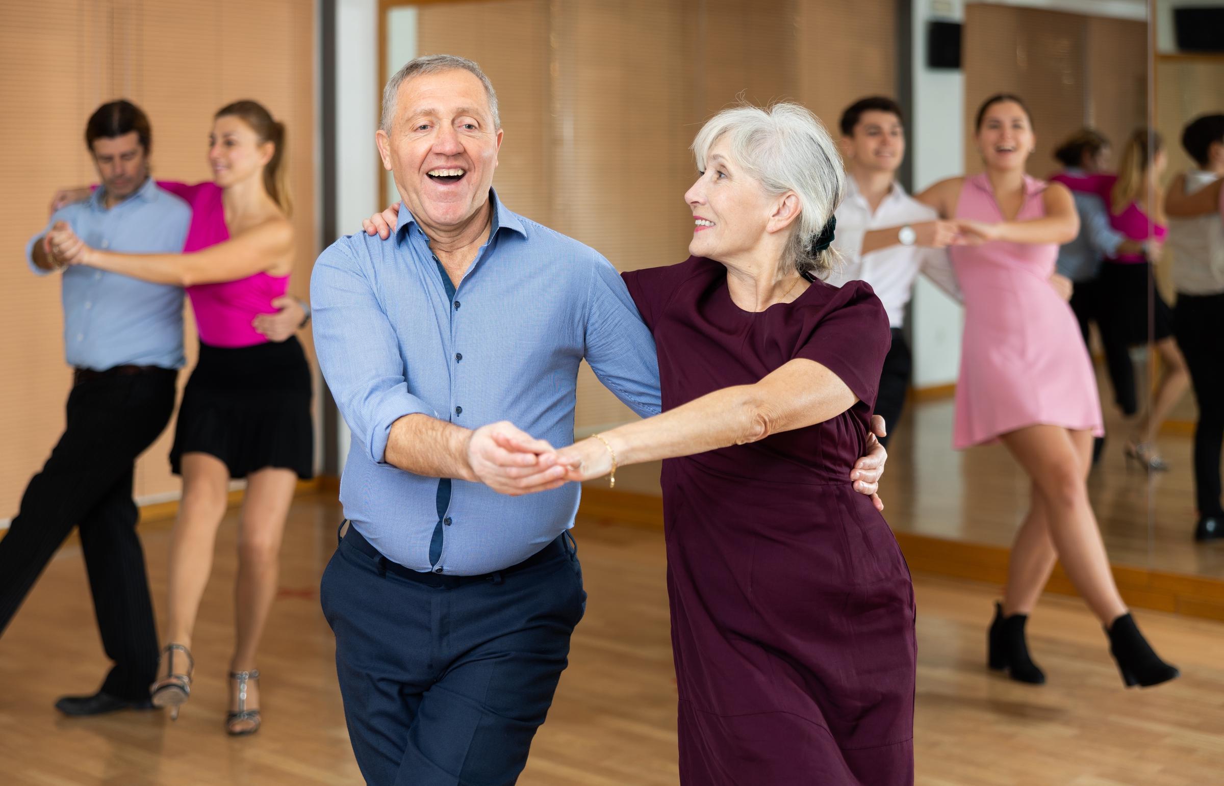 Happy couple dancing | Source: Shutterstock