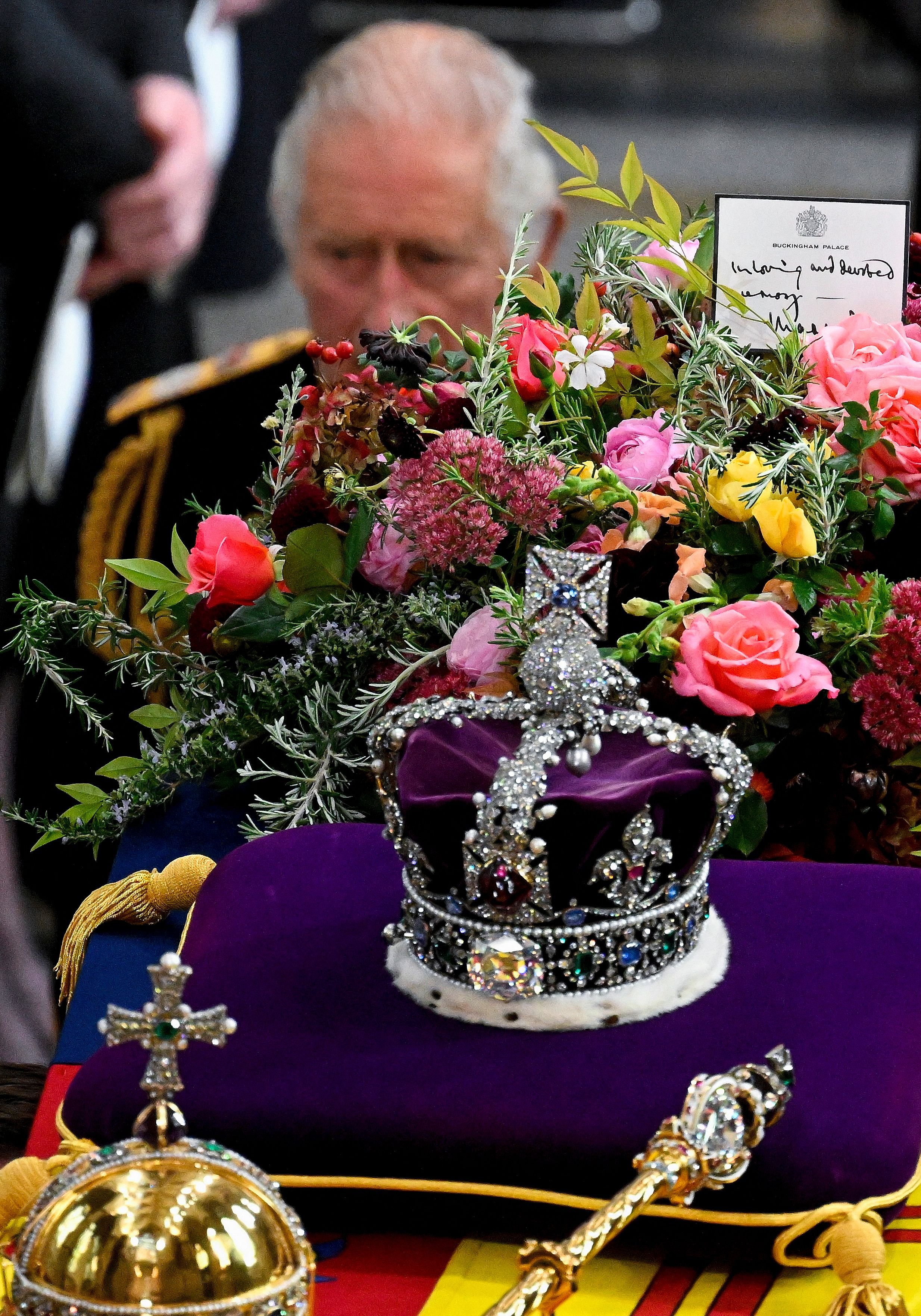 Britain's King Charles III walks behind the coffin of Queen Elizabeth II with the Imperial State Crown resting on top as it departs Westminster Abbey during the State Funeral in London, Britain, September 19, 2022 | Source: Getty Images 