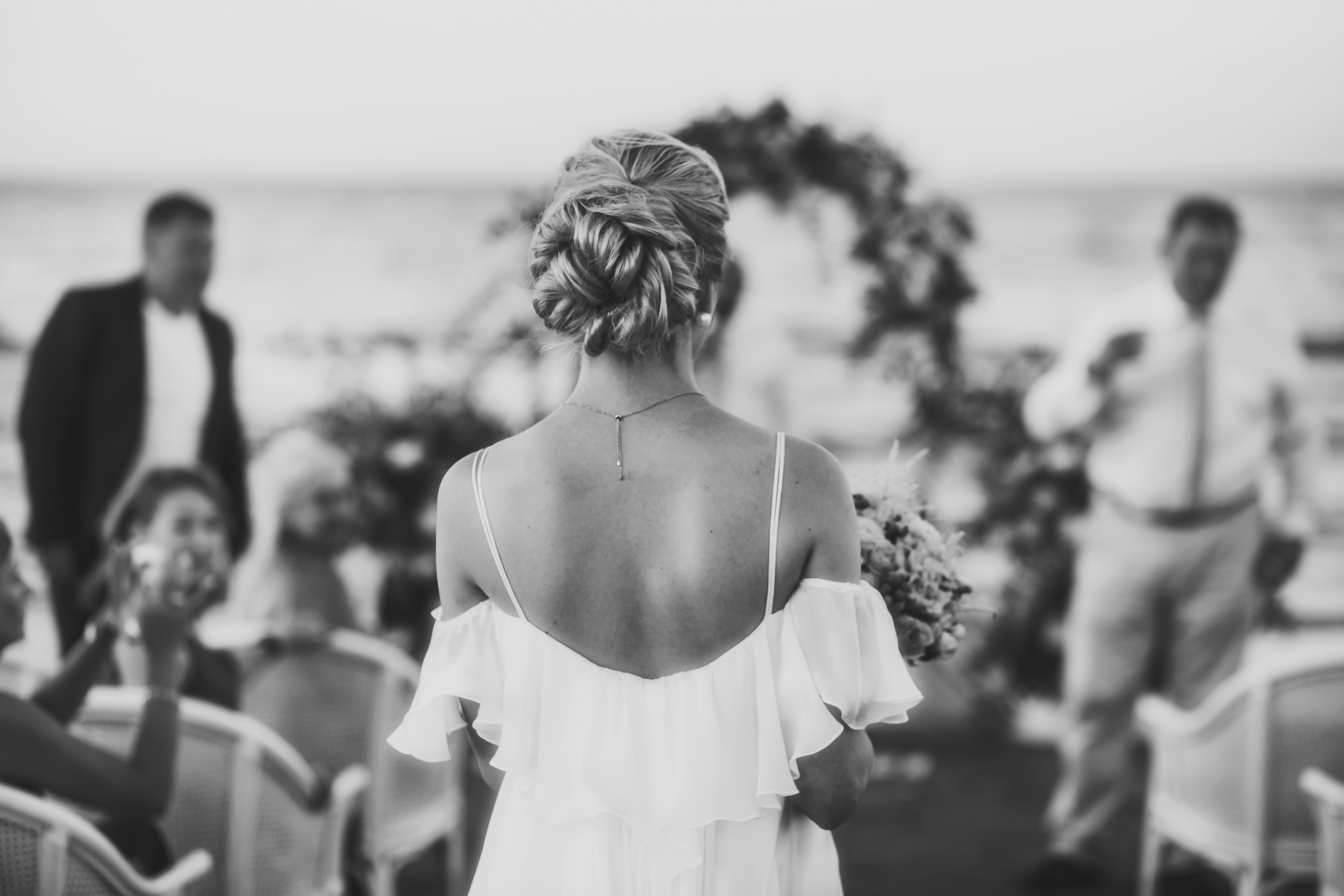 Back view of a bride walking down the aisle | Source: Shutterstock