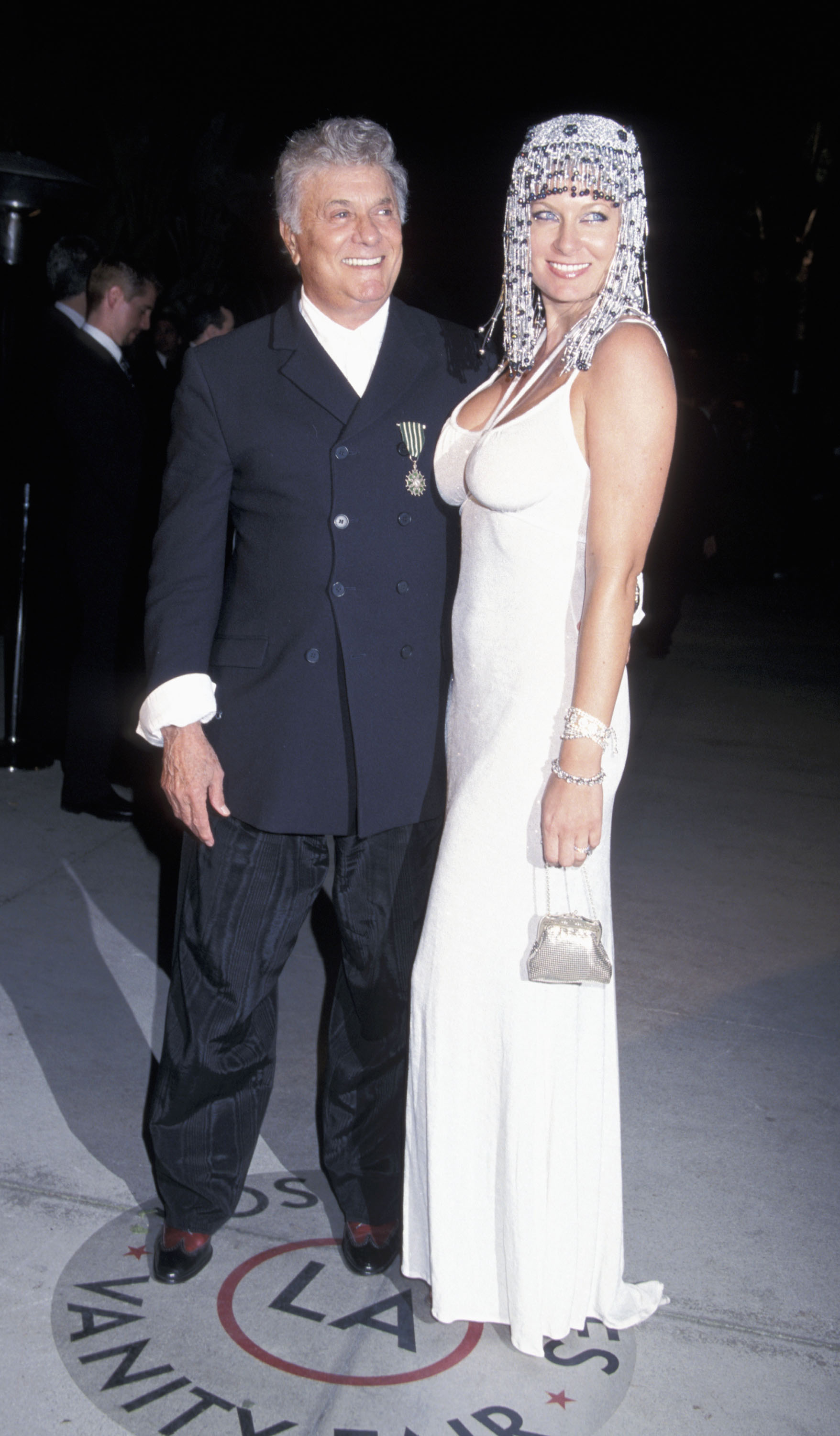 Tony Curtis and Jill Vandenberg Curtis during 1999 Vanity Fair Oscar Party - Arrivals at Morton's Restaurant in Los Angeles, California, United States. | Source: Getty Images