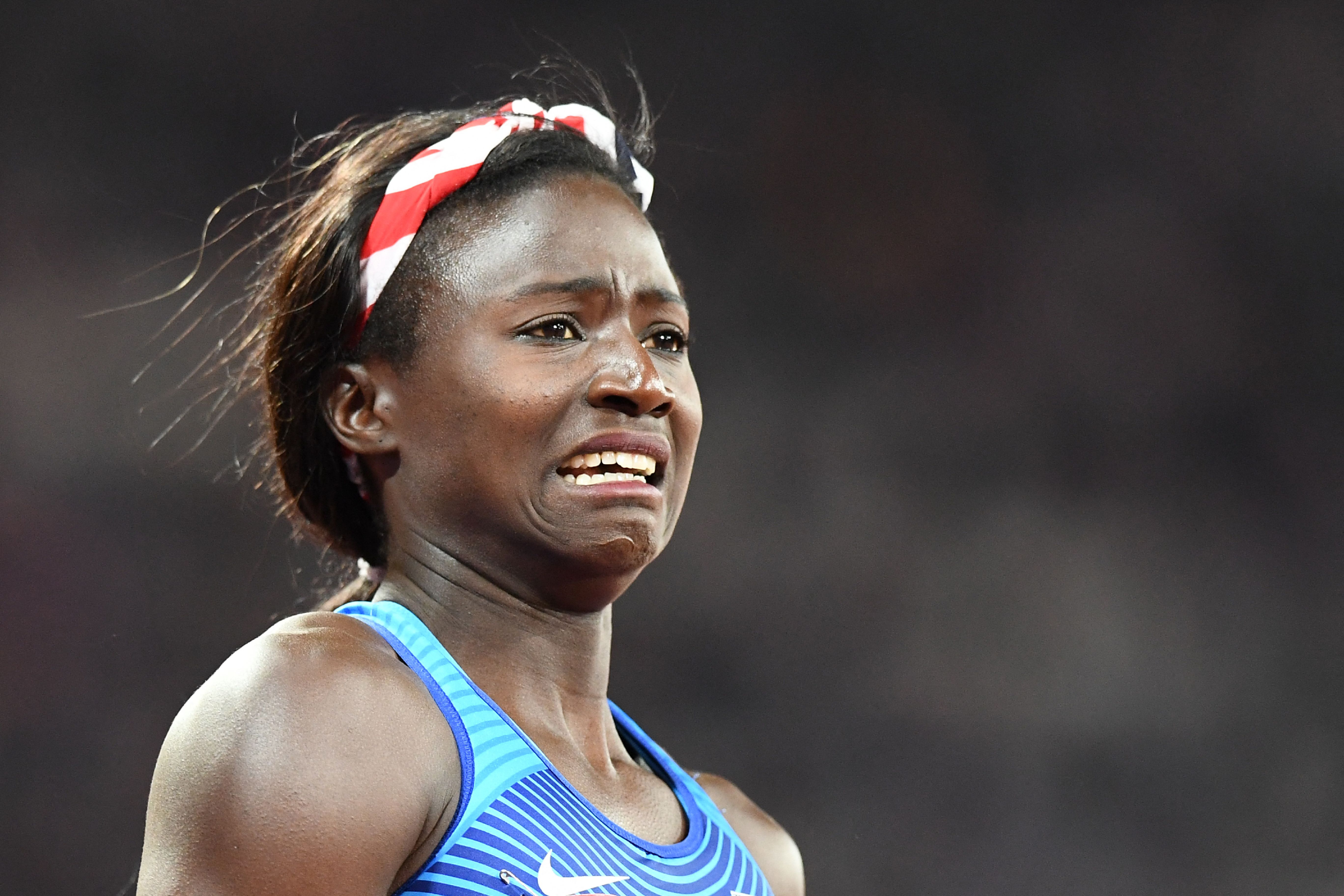 Tori Bowie reacts after winning the final of the women's 100m athletics event at the 2017 IAAF World Championships at the London Stadium in London on August 6, 2017. | Source: Getty Imagesa