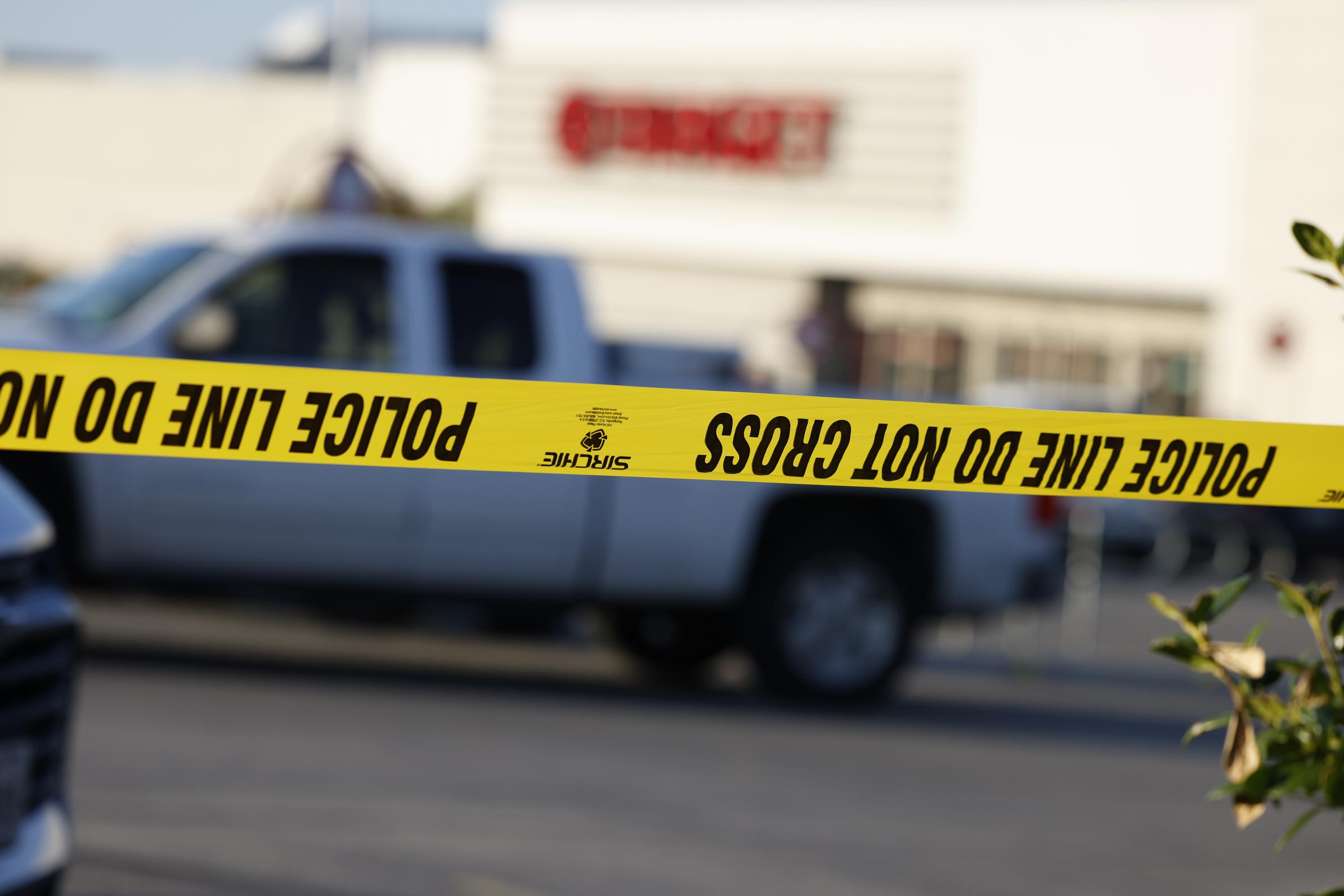 Police tape blocks off the scene outside the Target at 8601 Research Boulevard in Austin, Texas, after the August 11 shooting that left three dead. | Source: Getty Images