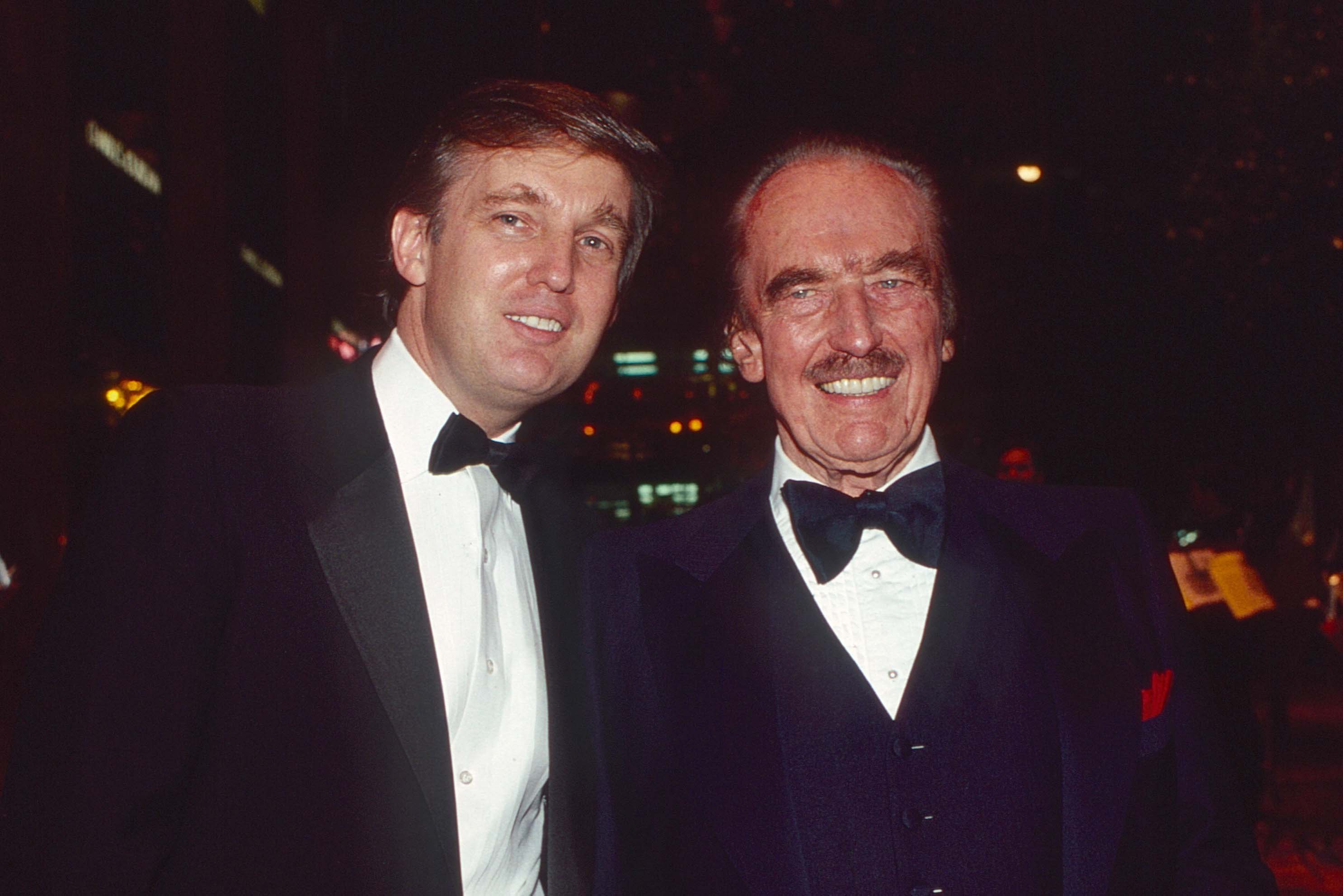 Donald and Fred Trump as they attend a book release party on December 12, 1987 | Source: Getty Images