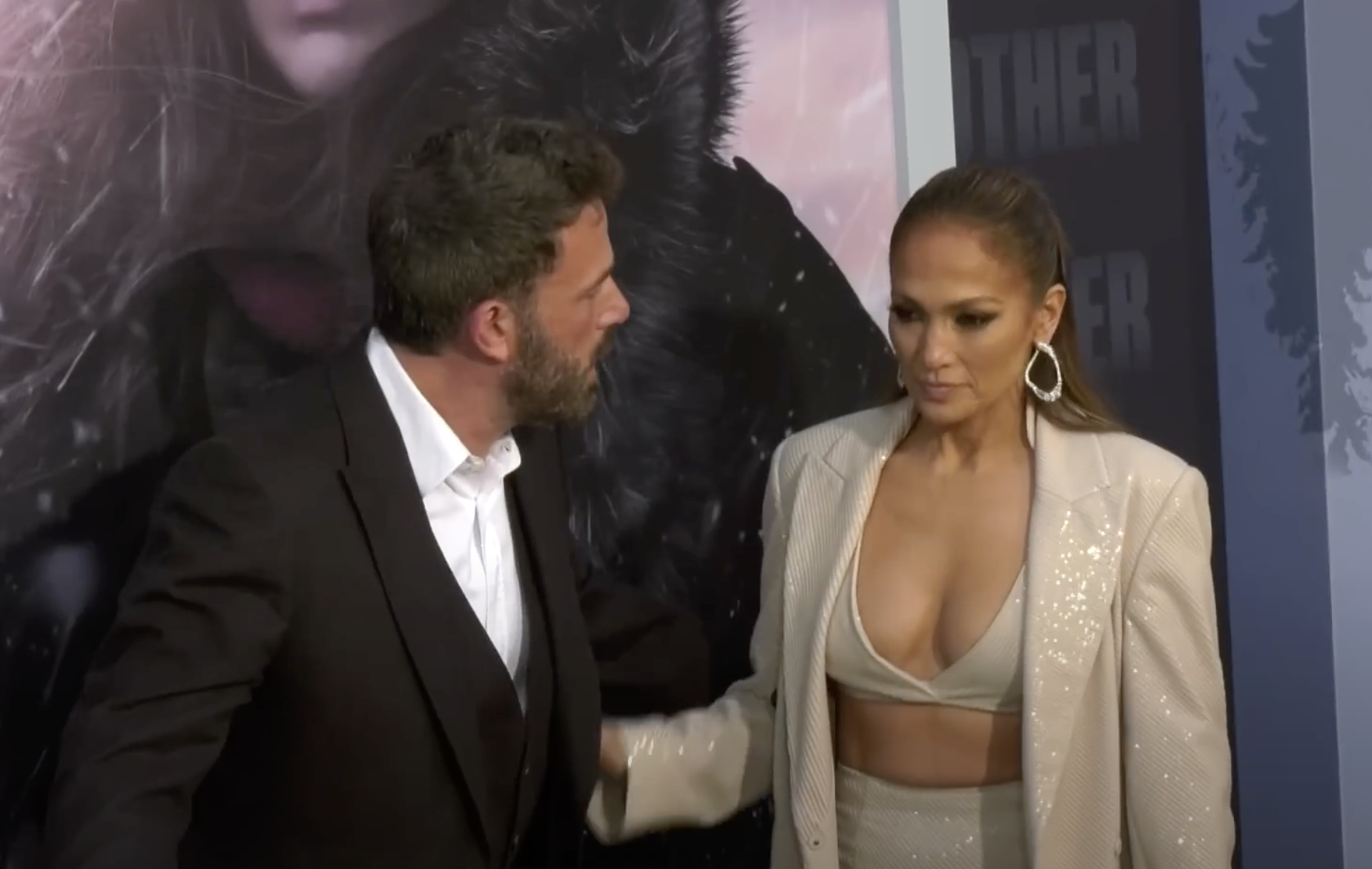 Ben Affleck and Jennifer Lopez talking on the red carpet at the premiere of "The Mother," dated May 12, 2023 | Source: YouTube/@theindependent