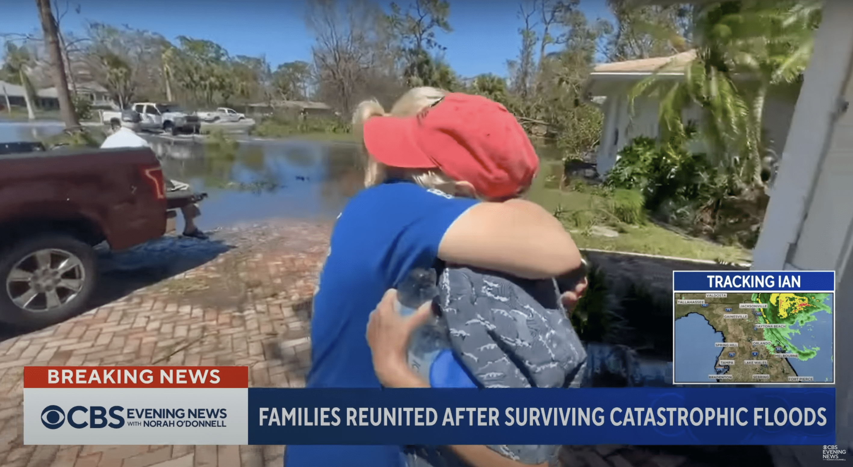 : yCecilia Donald and her daughter share an emotional hug. | Source: YouTube.com/CBS Evening News