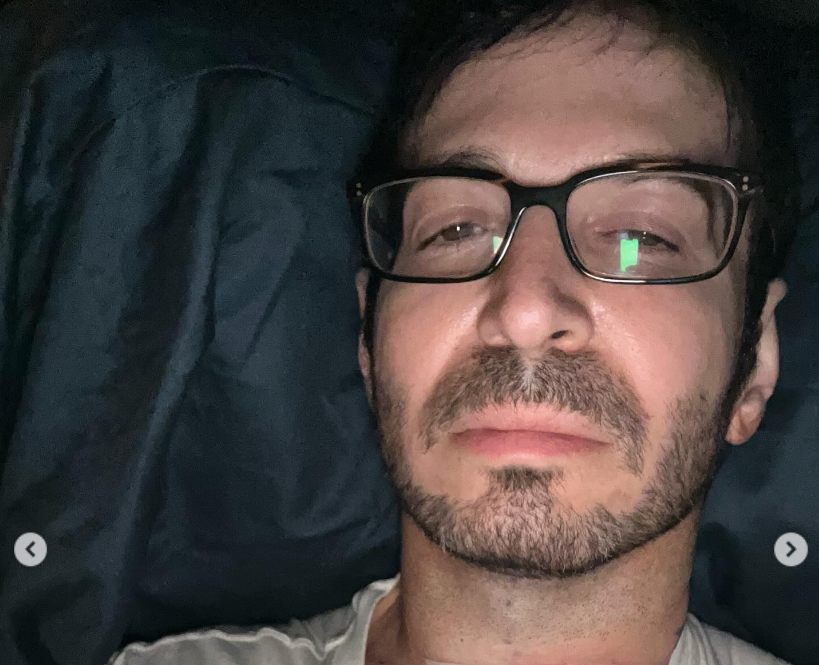 Brandon Frankel taking a selfie from a hospital bed, from a post dated February 20, 2026 | Source: Instagram/brandontour
