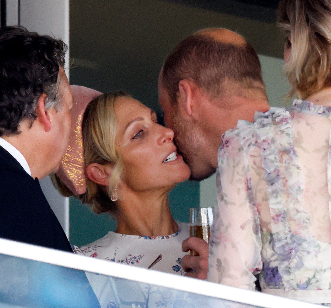Prince William kisses Zara Tindall on the cheek during day two of Royal Ascot on June 18, 2025, as the cousins share a brief and warm exchange in the royal box.