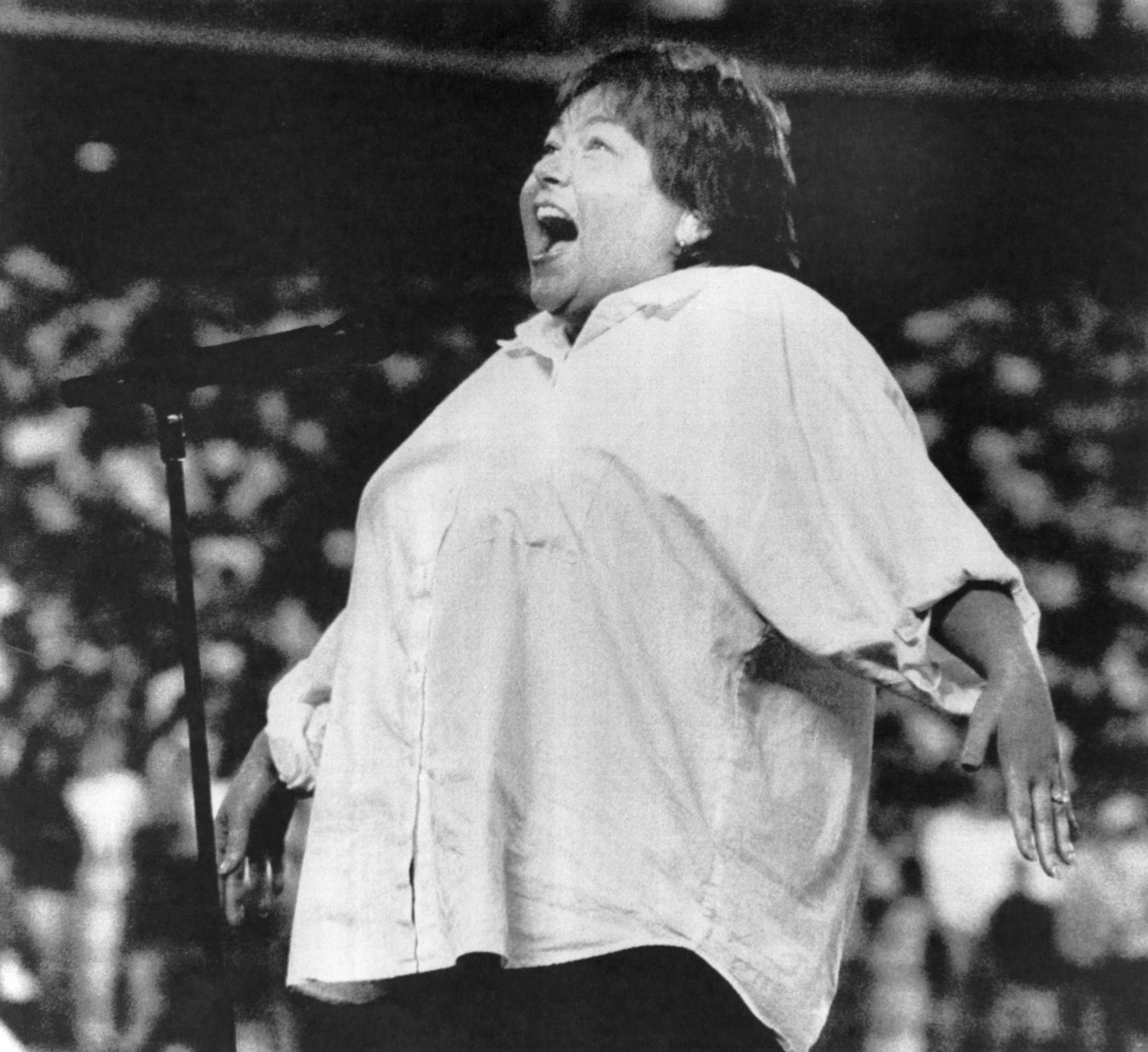 Television star Roseanne Barr delivered what was widely considered one of the worst vocal renditions of the national anthem prior to a game between the San Diego Padres and the Cincinnati Reds. In this photo, she sang at San Diego Stadium on July 25, 1990, in San Diego, California. | Source: Getty Images