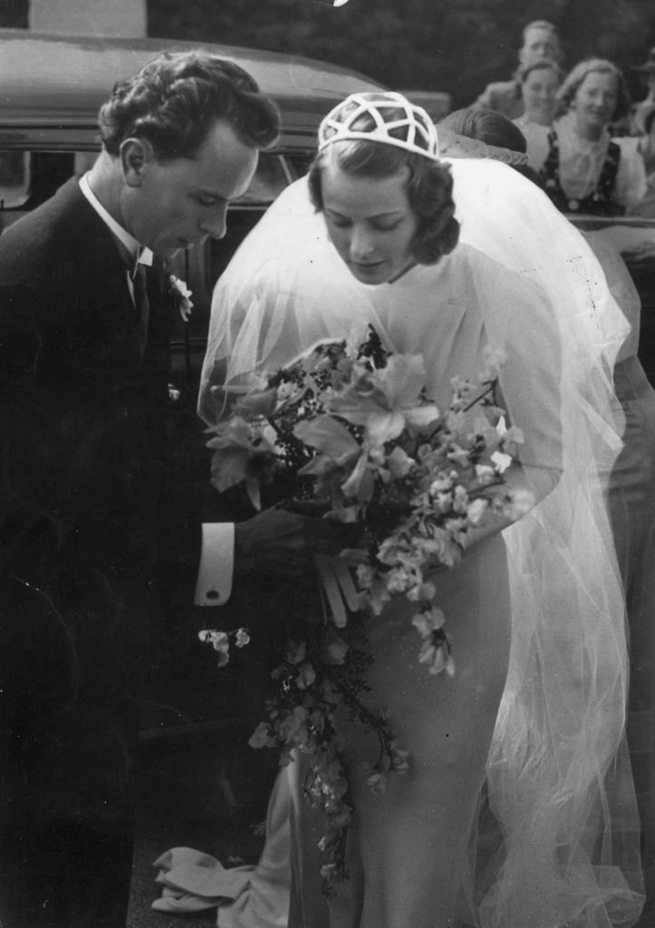 Swedish-born actor Ingrid Bergman with her first husband, dentist Dr. Petter Lindstrom, at their wedding in 1937| Source: Getty Images
