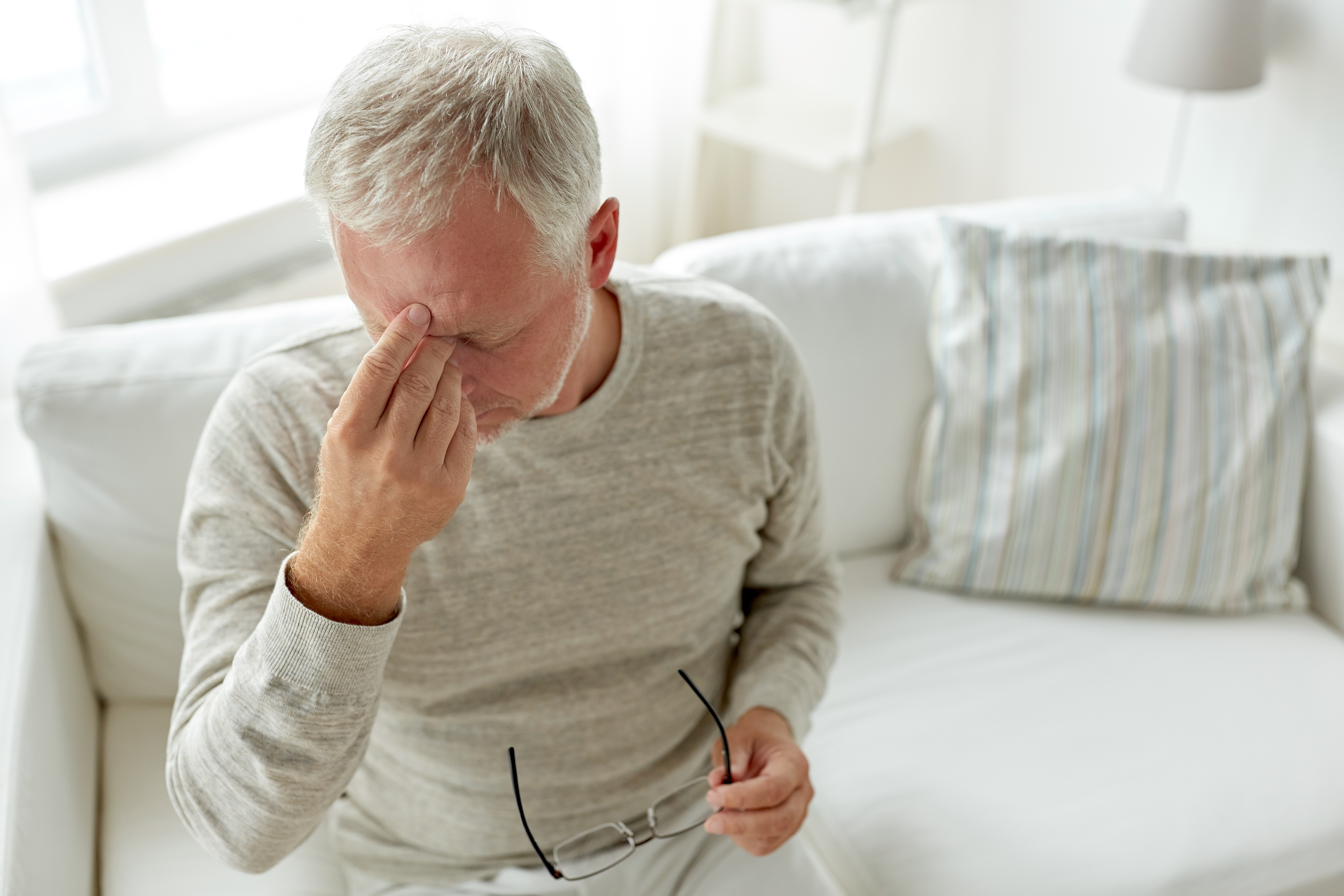 A stressed senior man at home | Source: Shutterstock