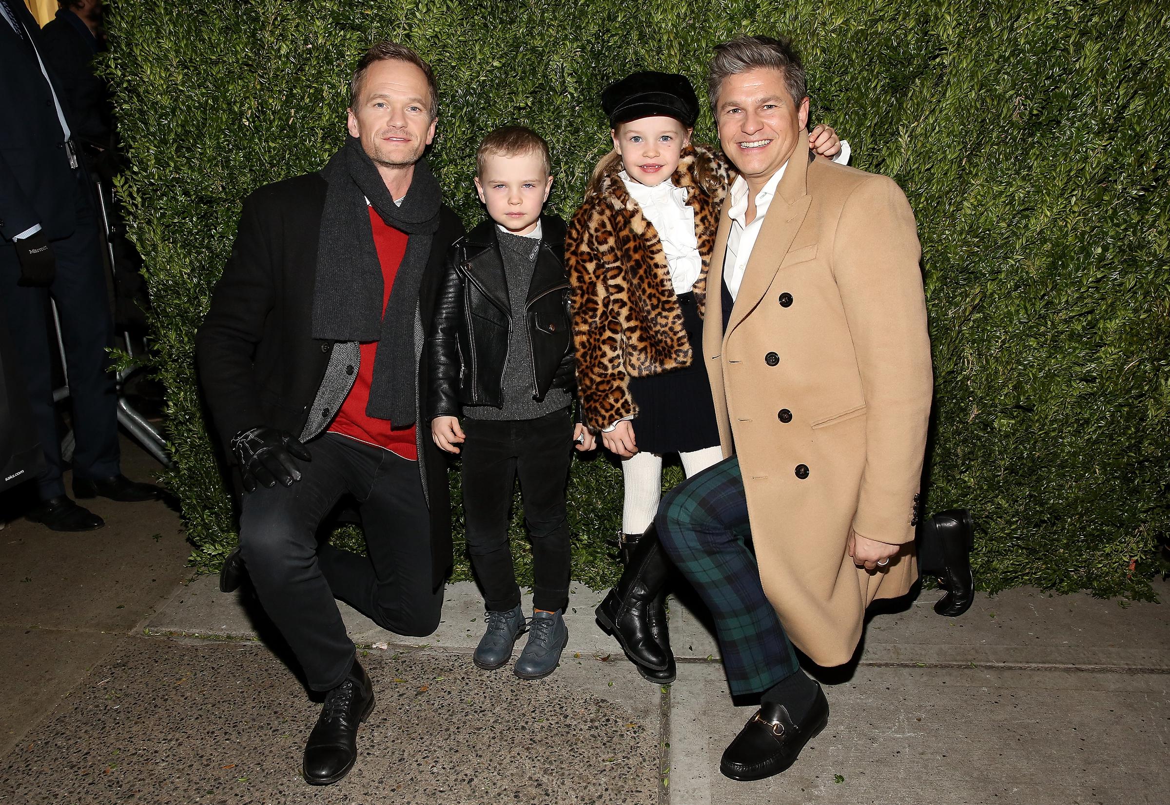 Neil Patrick Harris and David Burtka with their twins, Gideon Scott and Harper Grace Burtka-Harris, at the 2017 Saks Fifth Avenue Holiday Window Unveiling and Light Show on November 20 in New York. | Source: Getty Images