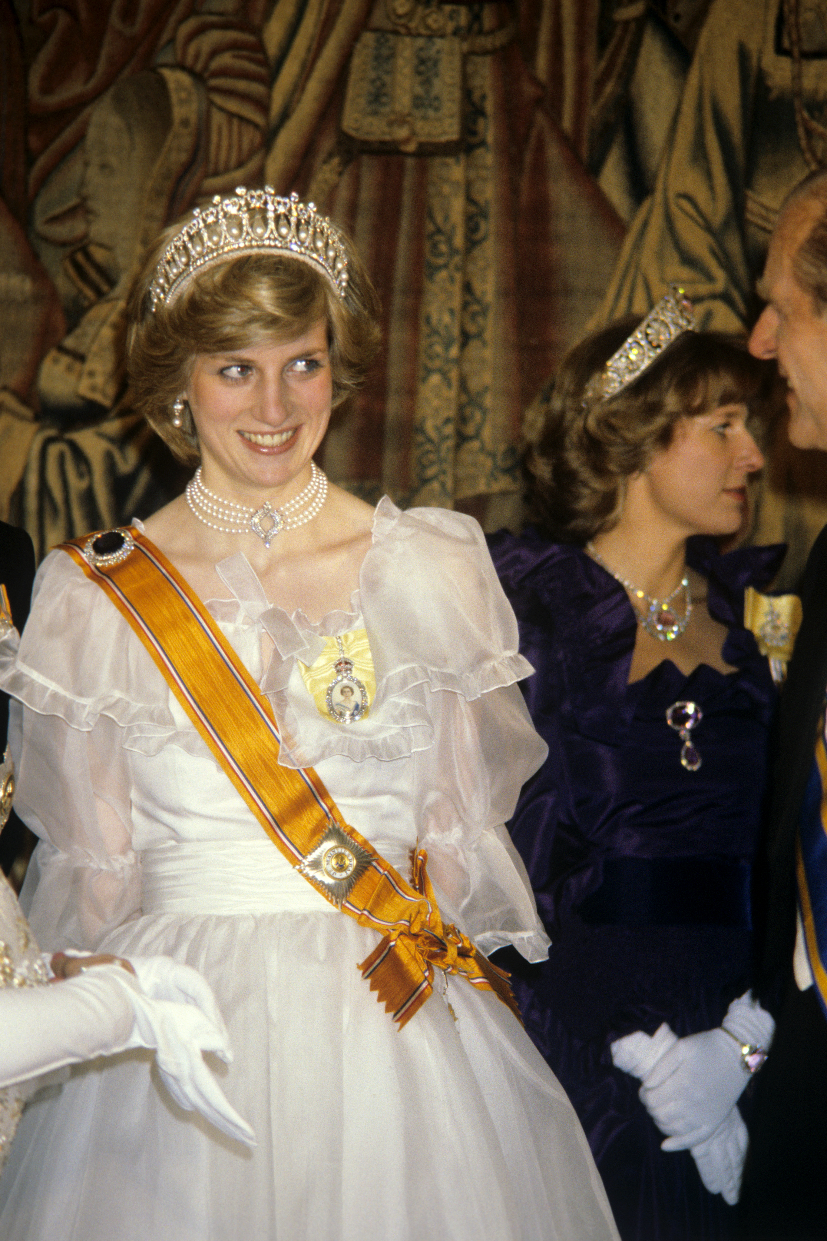 at a banquet for the British royal family given by Queen Beatrix and Prince Claus of the Netherlands at Hampton Court Palace, on November 17, 1982 | Source: Getty Images