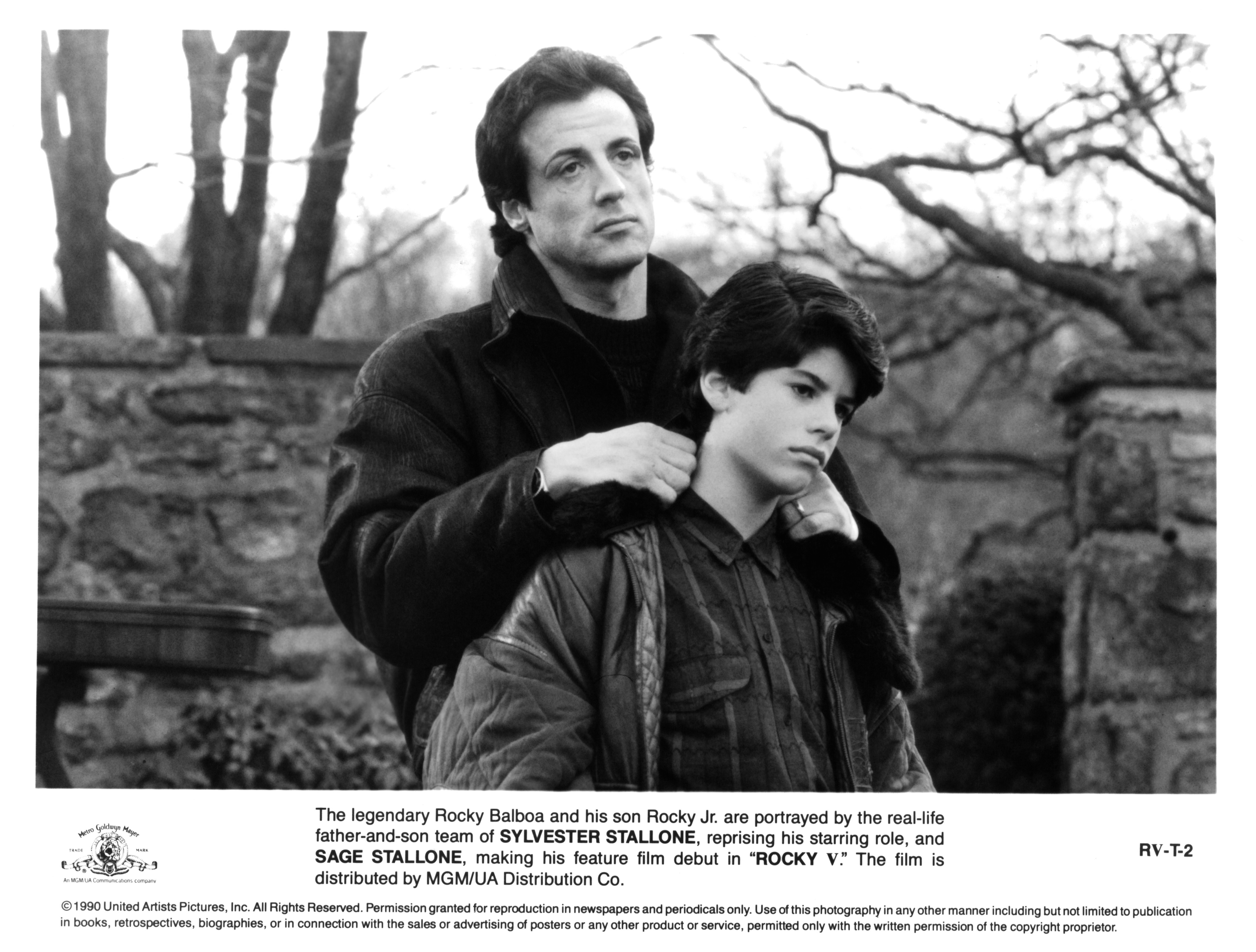 The boy and his father on the set of the MGM/UA movie "Rocky V" in 1990 | Source: Getty Images