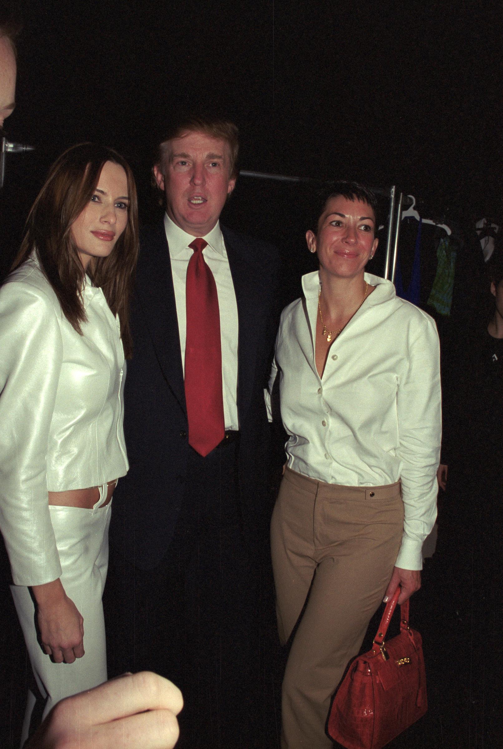 Melania and Donald Trump, Ghislaine Maxwell attend the Anand Jon Fashion Show in New York City on September 18, 2000 | Source: Getty Images