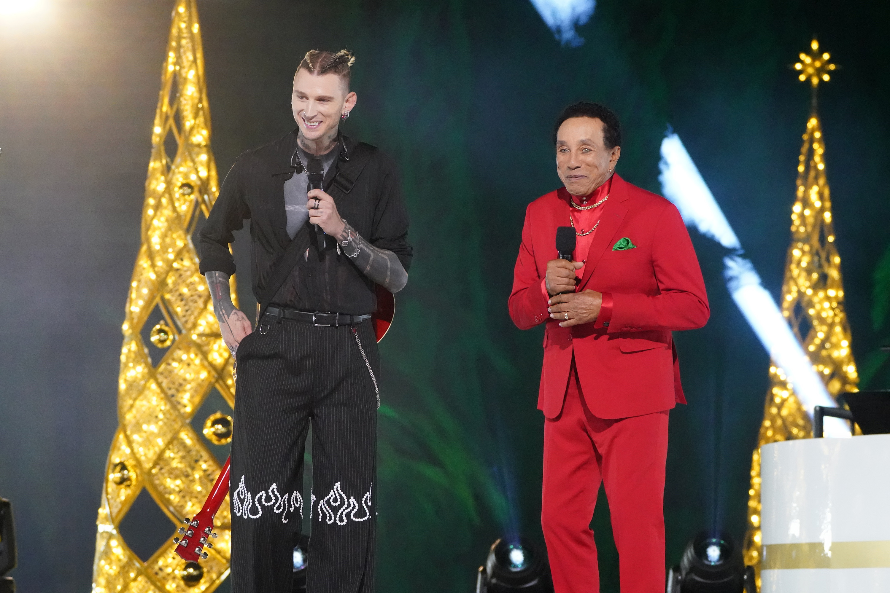 Machine Gun Kelly and Smokey Robinson on "A Motown Christmas," on December 11, 2024 | Source: Getty Images