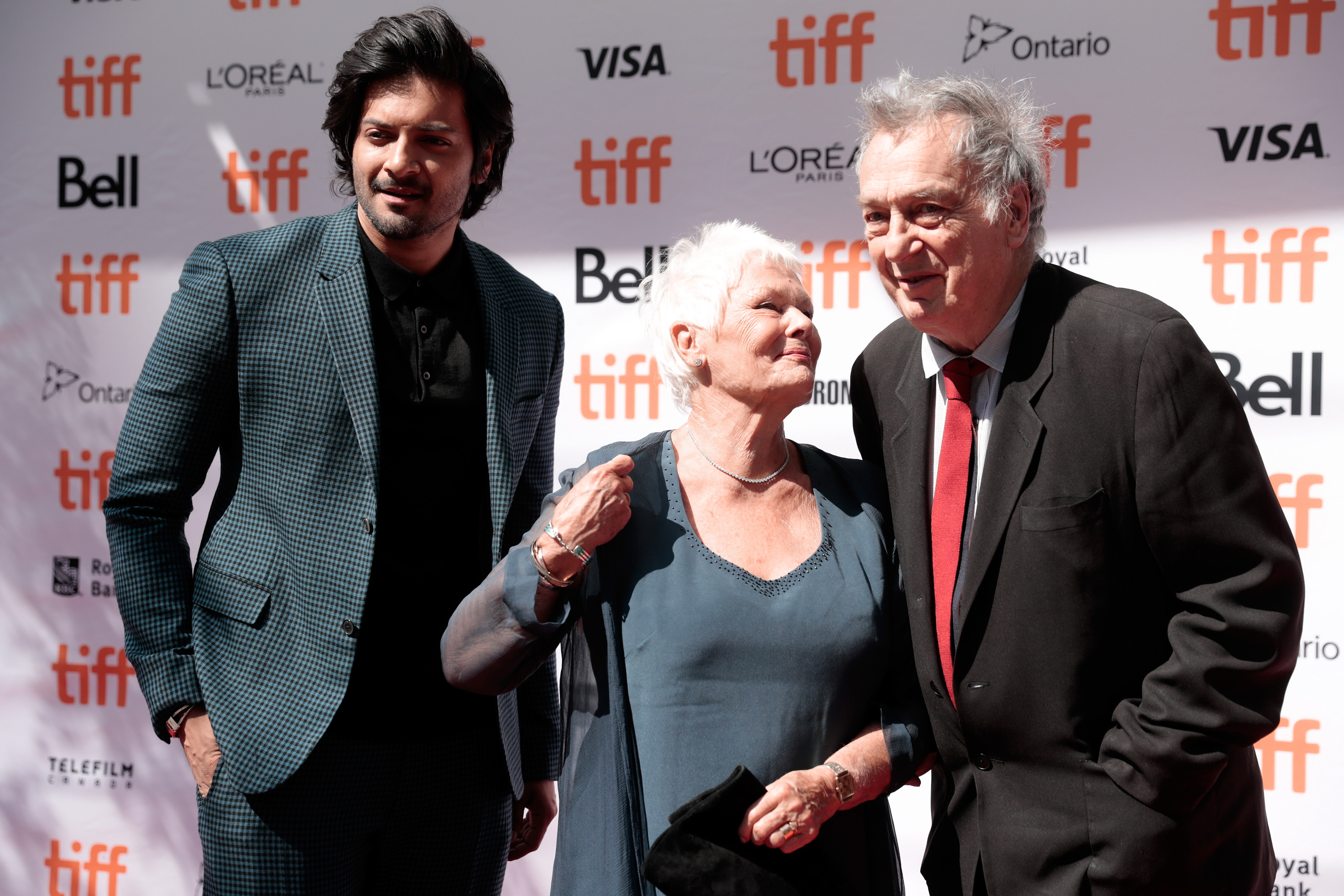 Ali Fazal, Judi Dench, and Stephen Frears at the premiere of "Victoria & Abdul" during the 2017 Toronto International Film Festival in Toronto, Canada, on September 10, 2017 | Source: Getty Images