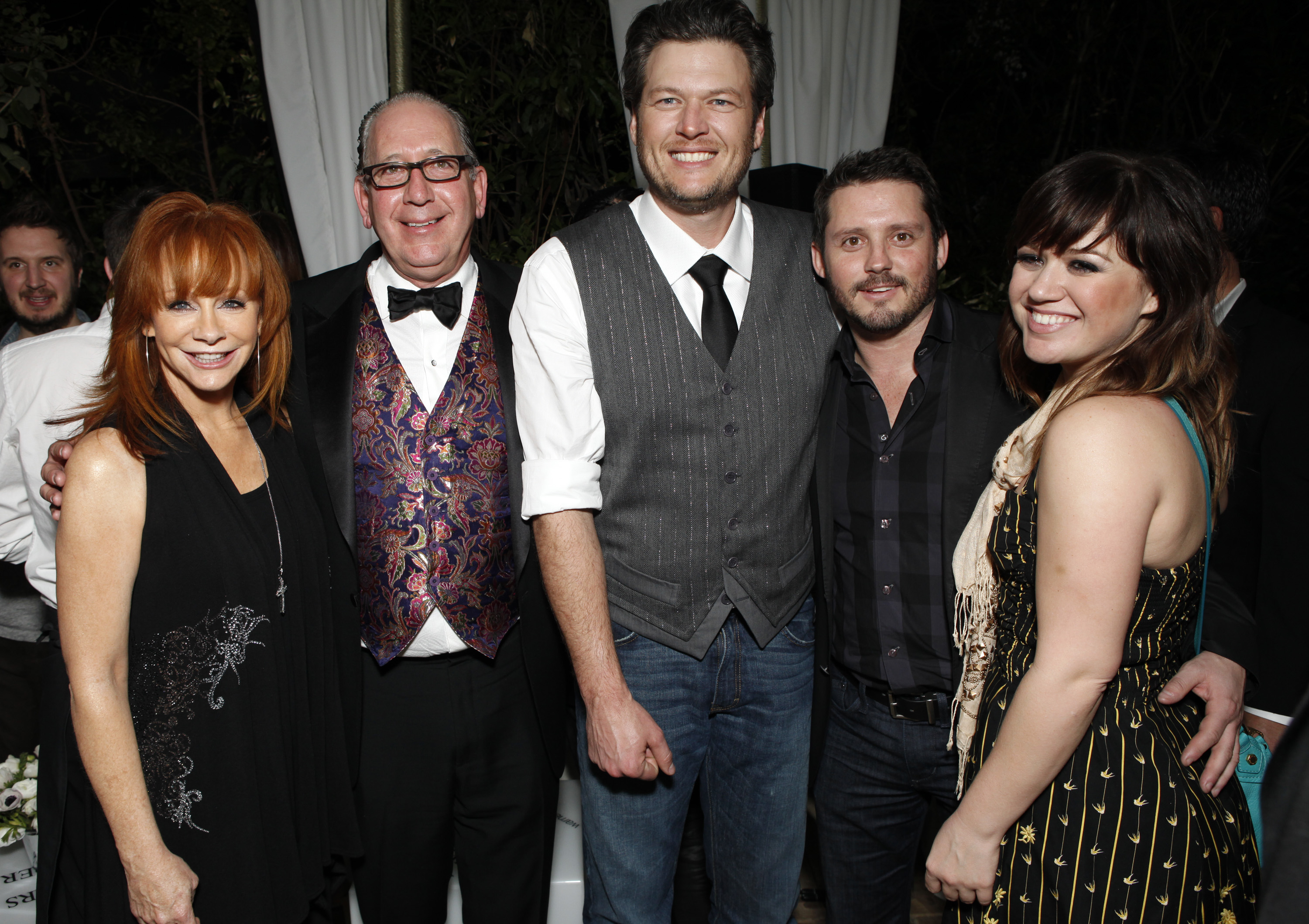 Reba McEntire, Warner Music Nashville's President and CEO John Espositio, Blake Shelton, Brandon Blackstock, and Kelly Clarkson at the Warner Music Group Grammy Celebration on February 12, 2012, in Los Angeles, California. | Source: Getty Images
