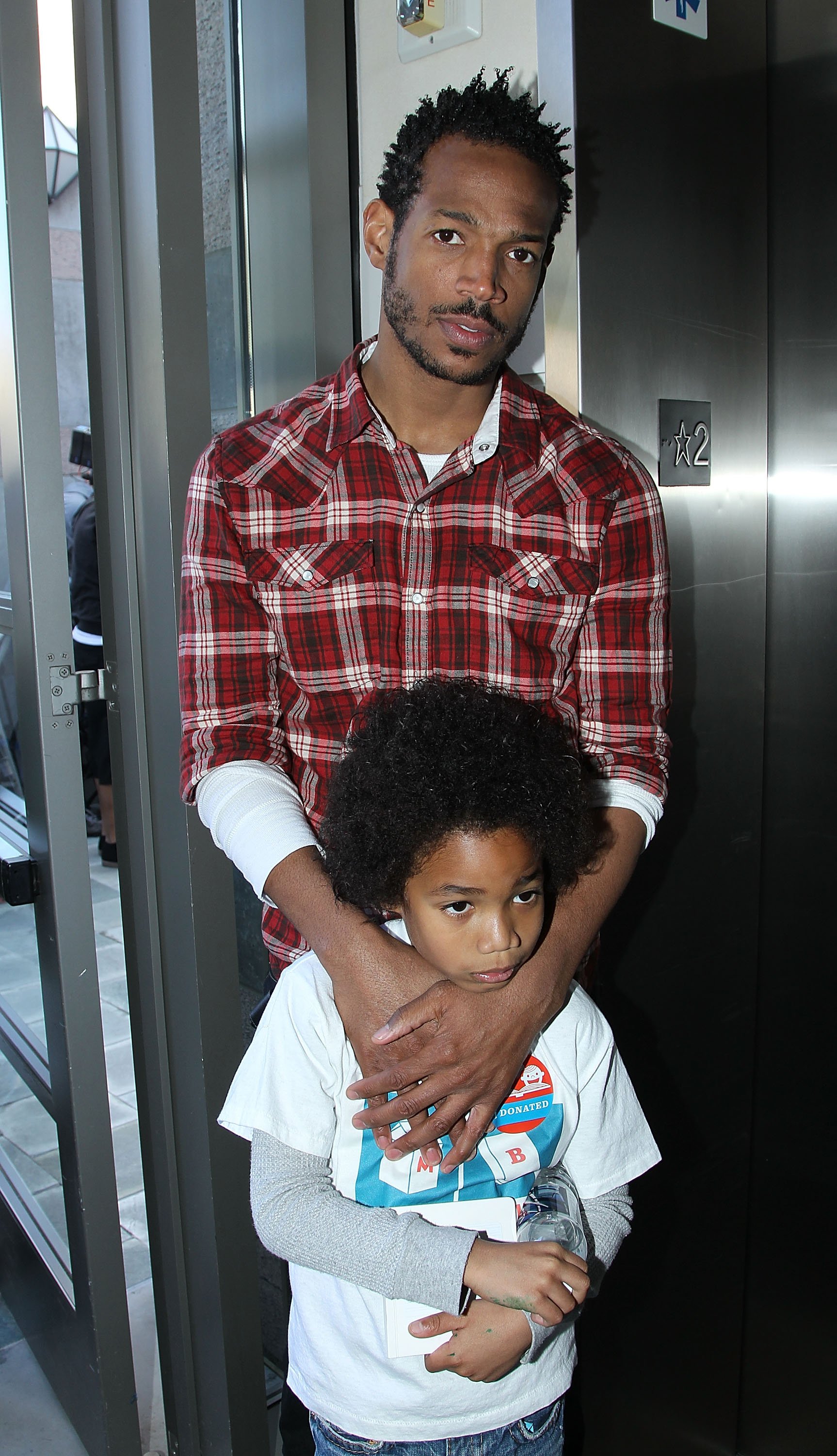 Marlon Wayans and Shawn Howell Wayans at the Milk and Bookies First Annual Story Time Celebration hosted at The Skirball Cultural Center in Los Angeles, California, on February 28, 2010 | Source: Getty Images