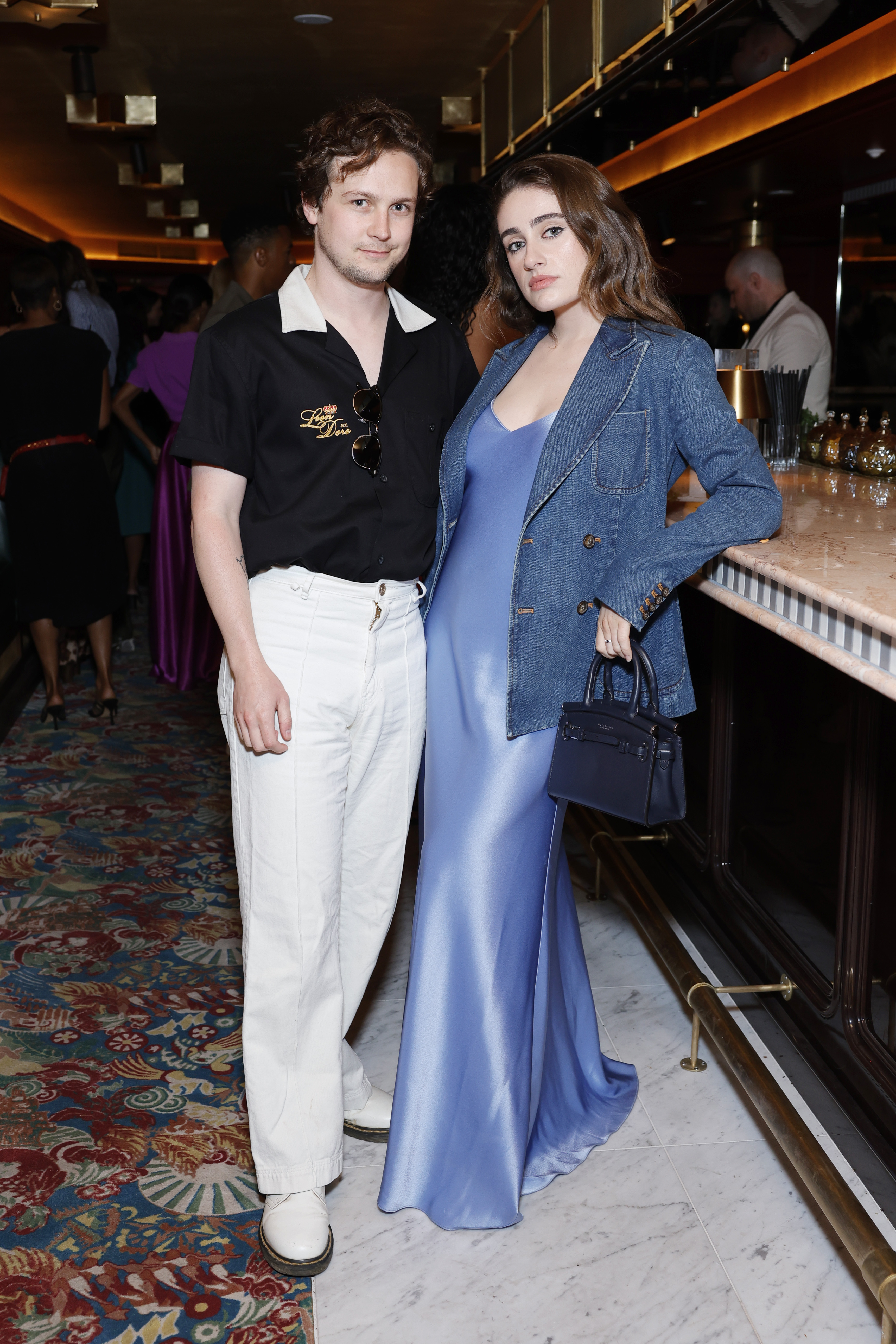 Rachel Sennott, wearing Polo Ralph Lauren (R) and a guest attend "ELLE Hollywood Rising" Presented by Polo Ralph Lauren at The Georgian Hotel on May 11, 2023 in Santa Monica, California. | Source: Getty Images