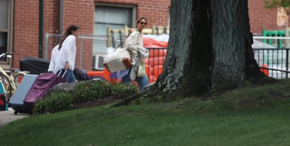 Katie Holmes and daughter, Suri, seen taking bags into college dorm, dated August 20, 2024 | Source: Youtube/Page Six