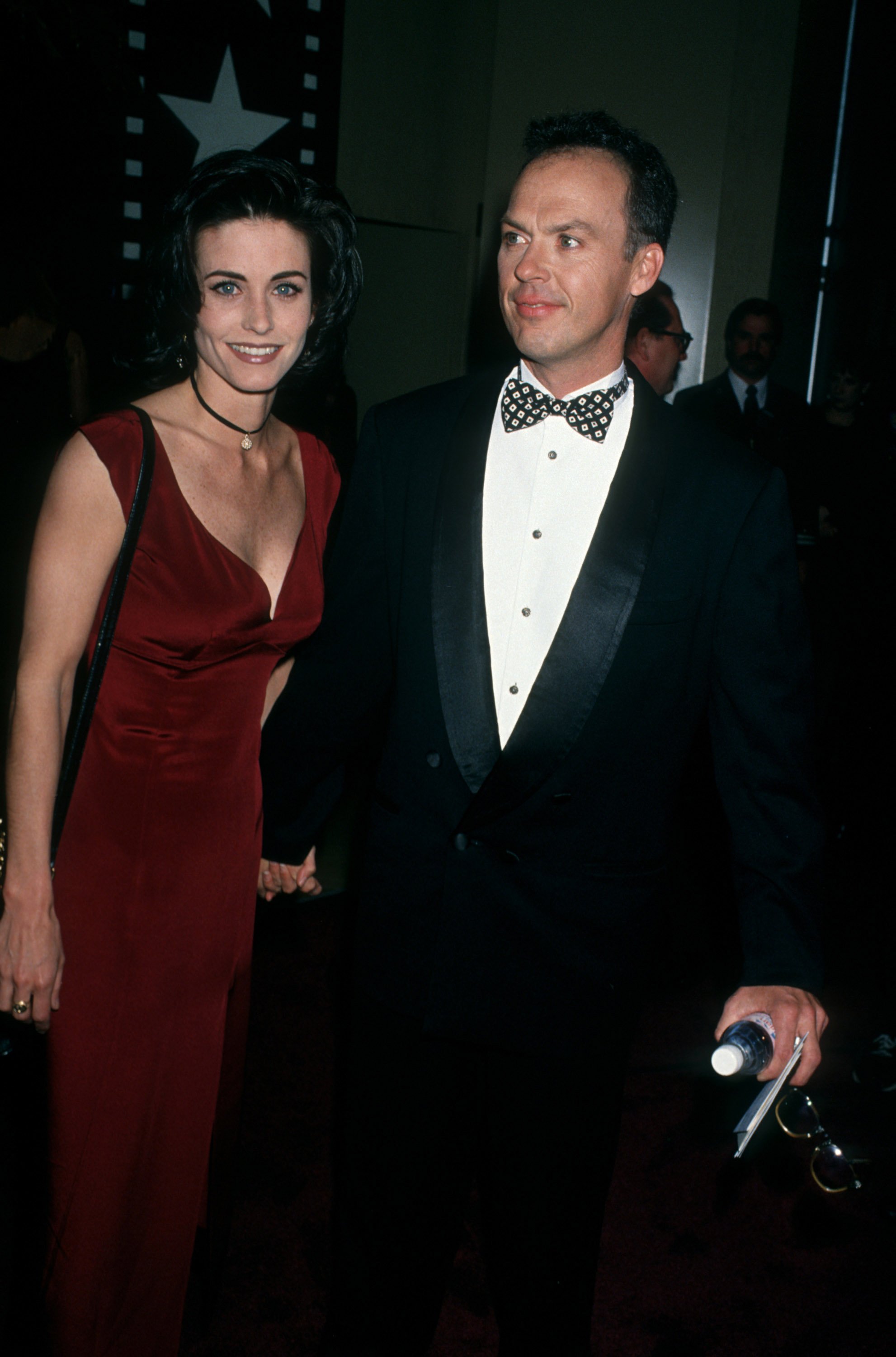 Michael Keaton and Courteney Cox at the 22nd Annual American Film Institute Lifetime Achievement Awards at the Beverly Hilton Hotel in Beverly Hills, California, on March 3, 1994. | Source: Getty Images