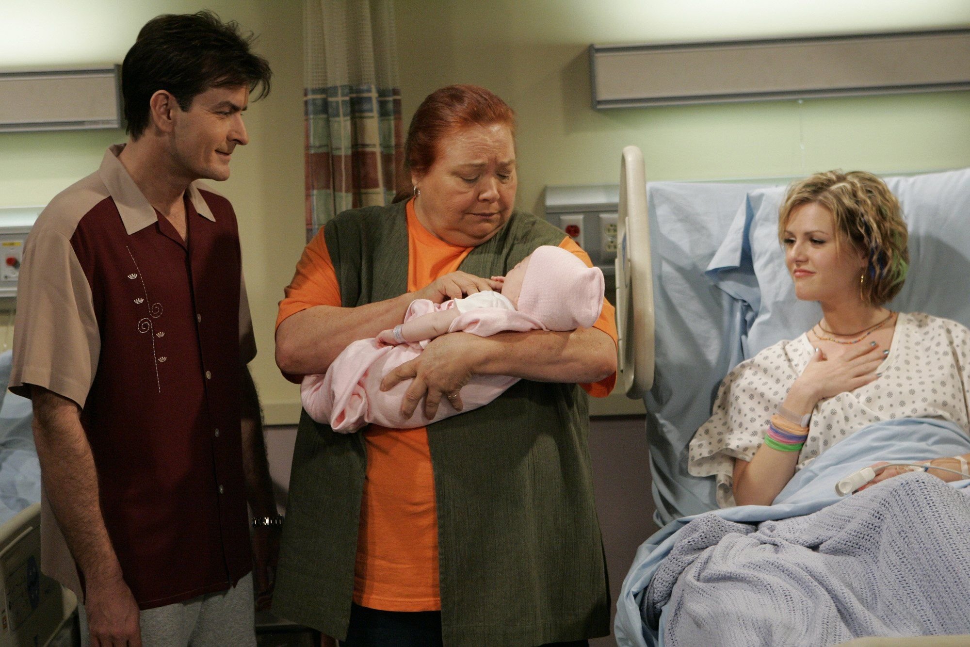 Conchata Ferrell and Charlie Sheen during a scene in an episode of "Two and a Half Men" | Source: Getty Images