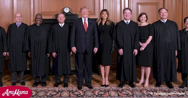 President Trump and First Lady Melania pose for a picture before attending Supreme Court ceremony