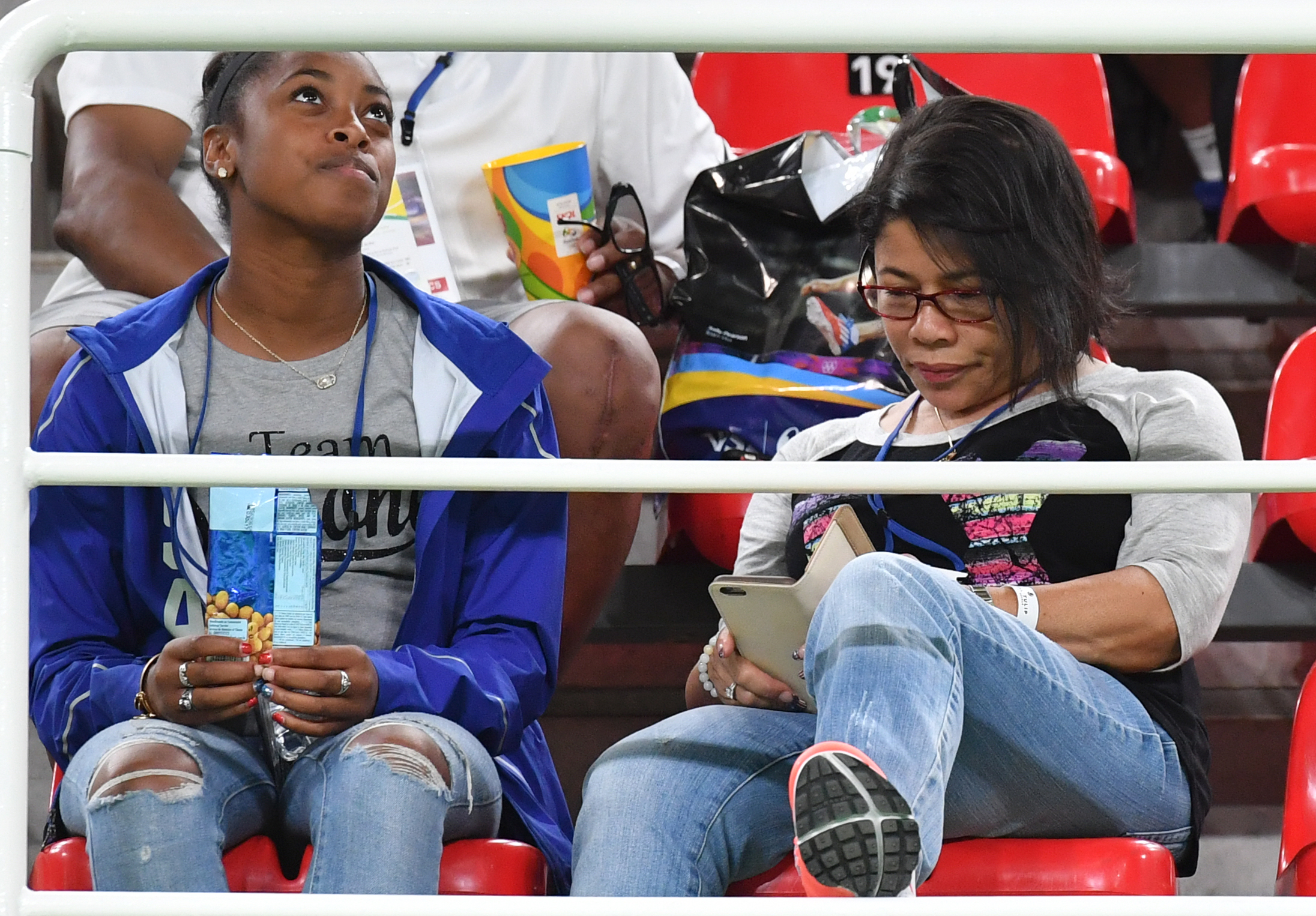 Simone Biles' sister and grandmother attend the Artistic Gymnastics at the Olympic Arena during the Rio 2016 Olympic Games in Rio de Janeiro on August 14, 2016. | Source: Getty Images