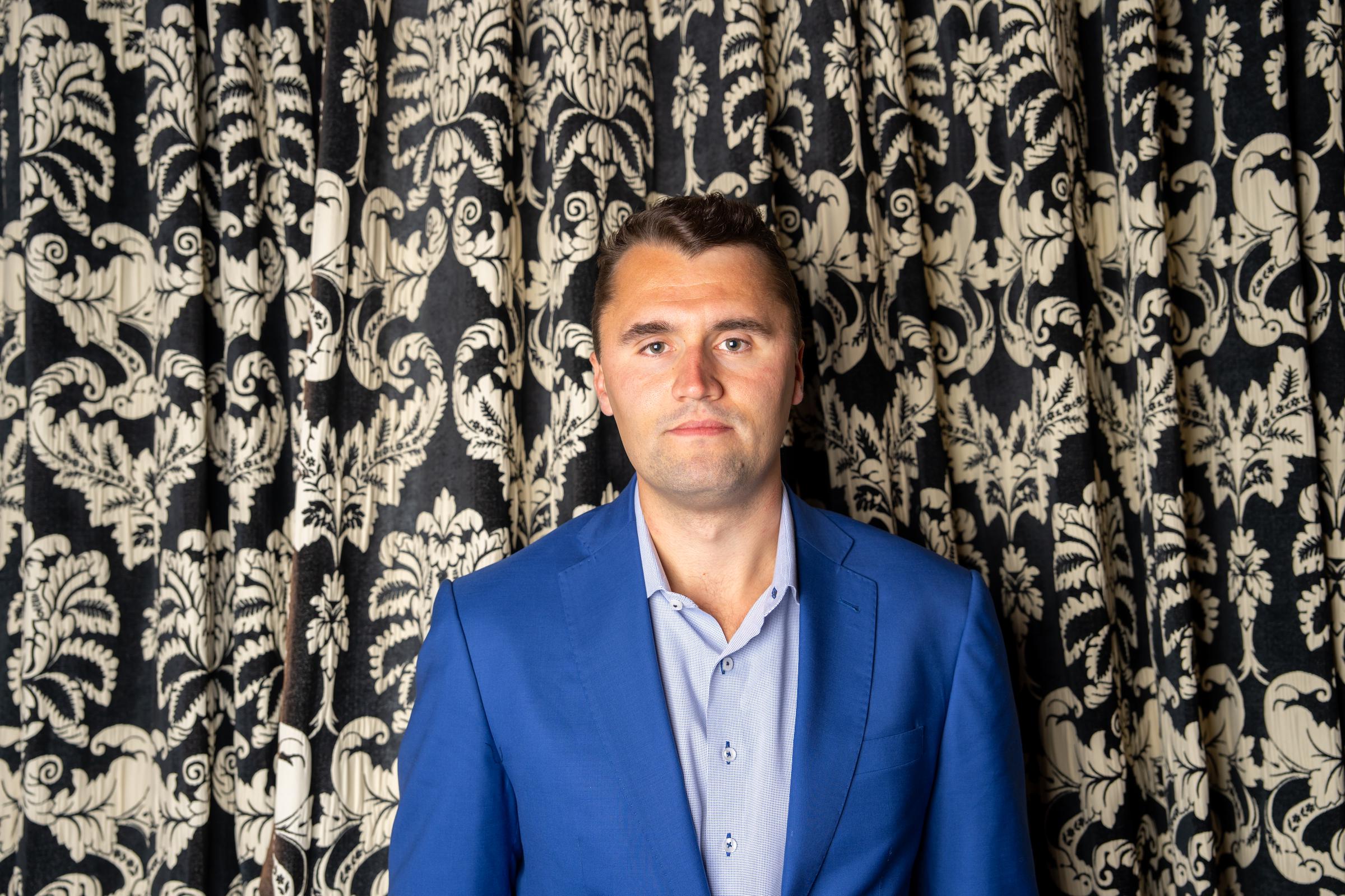 Charlie Kirk poses at The Cambridge Union on May 19, 2025, in Cambridge, Cambridgeshire | Source: Getty Images