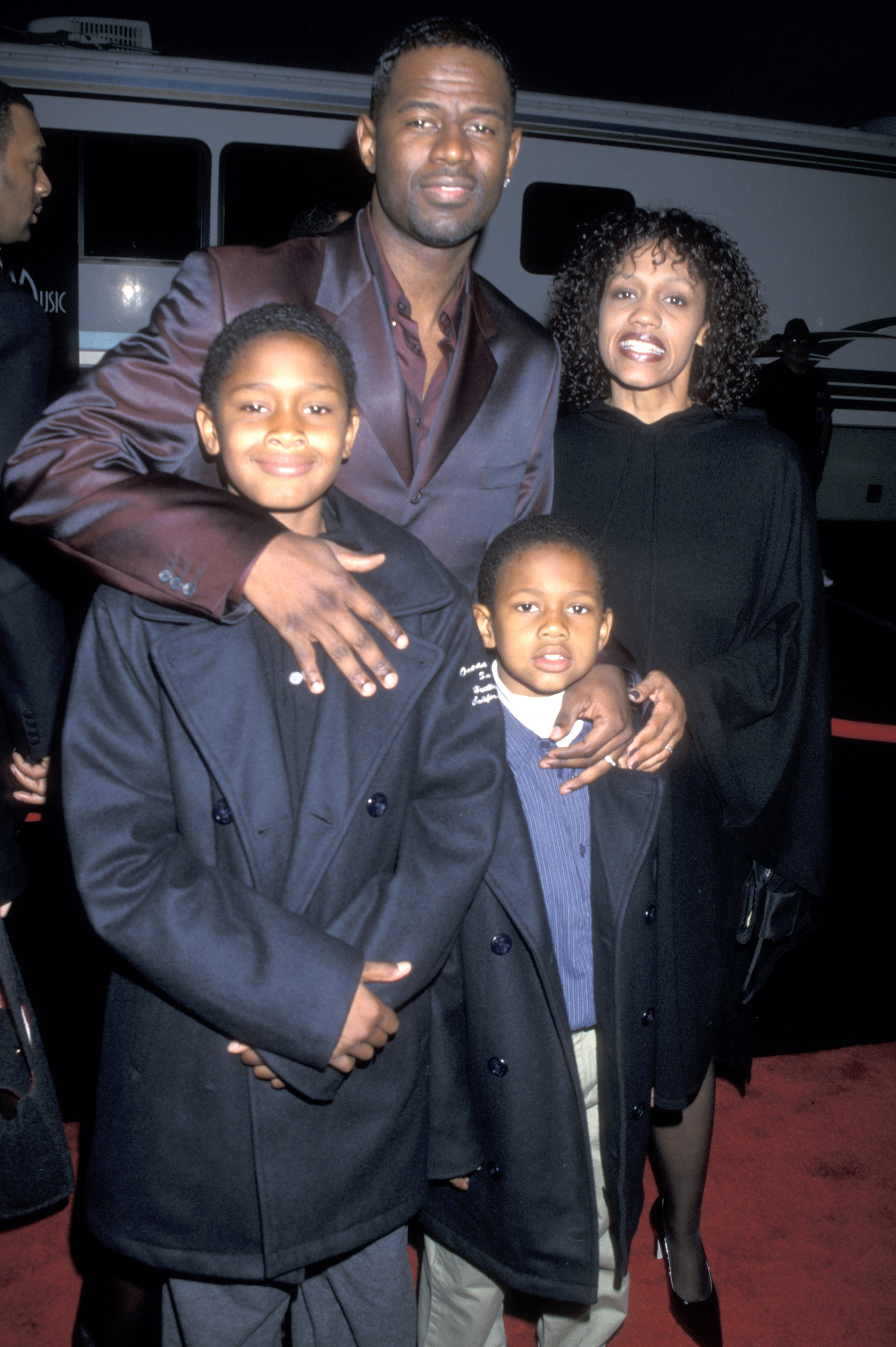 Brian McKnight with then-wife and sons at the American Music Awards in Los Angeles on January 17, 2000. | Source: Getty Images