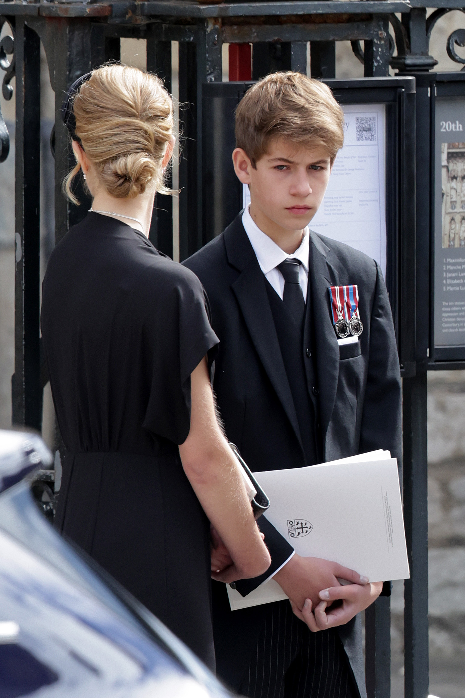 Sombre and composed: James departs Westminster Abbey following the State Funeral of Queen Elizabeth II on 19 September 2022. Dressed in black and wearing medals, he carried the order of service as Britain bid farewell to its longest-reigning monarch.