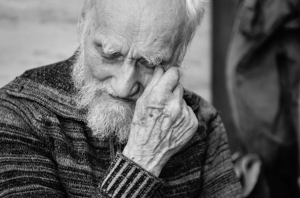 A monochrome photo of an elderly man | Photo: Shutterstock