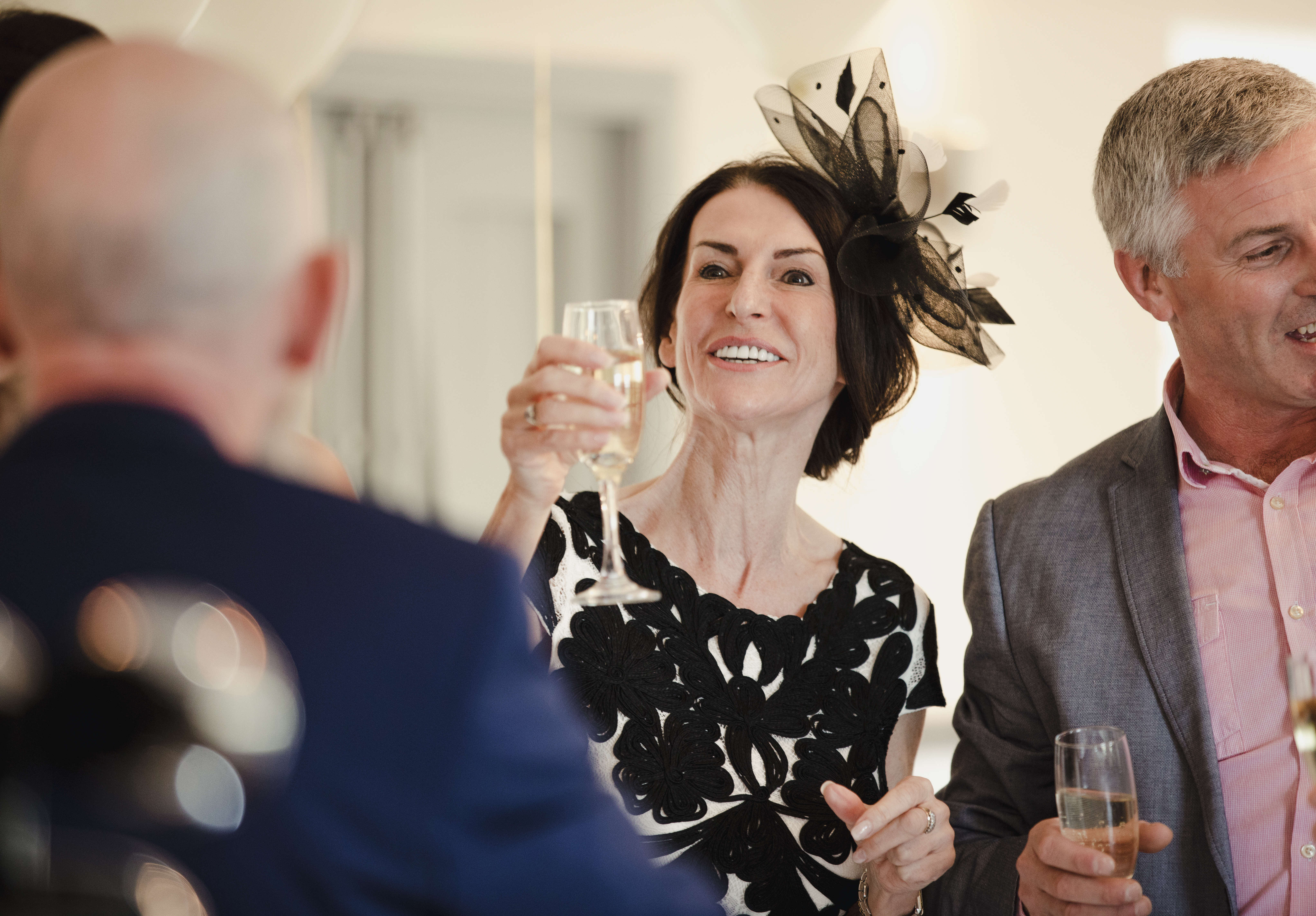 A woman shares a toast at a wedding | Source: Shutterstock