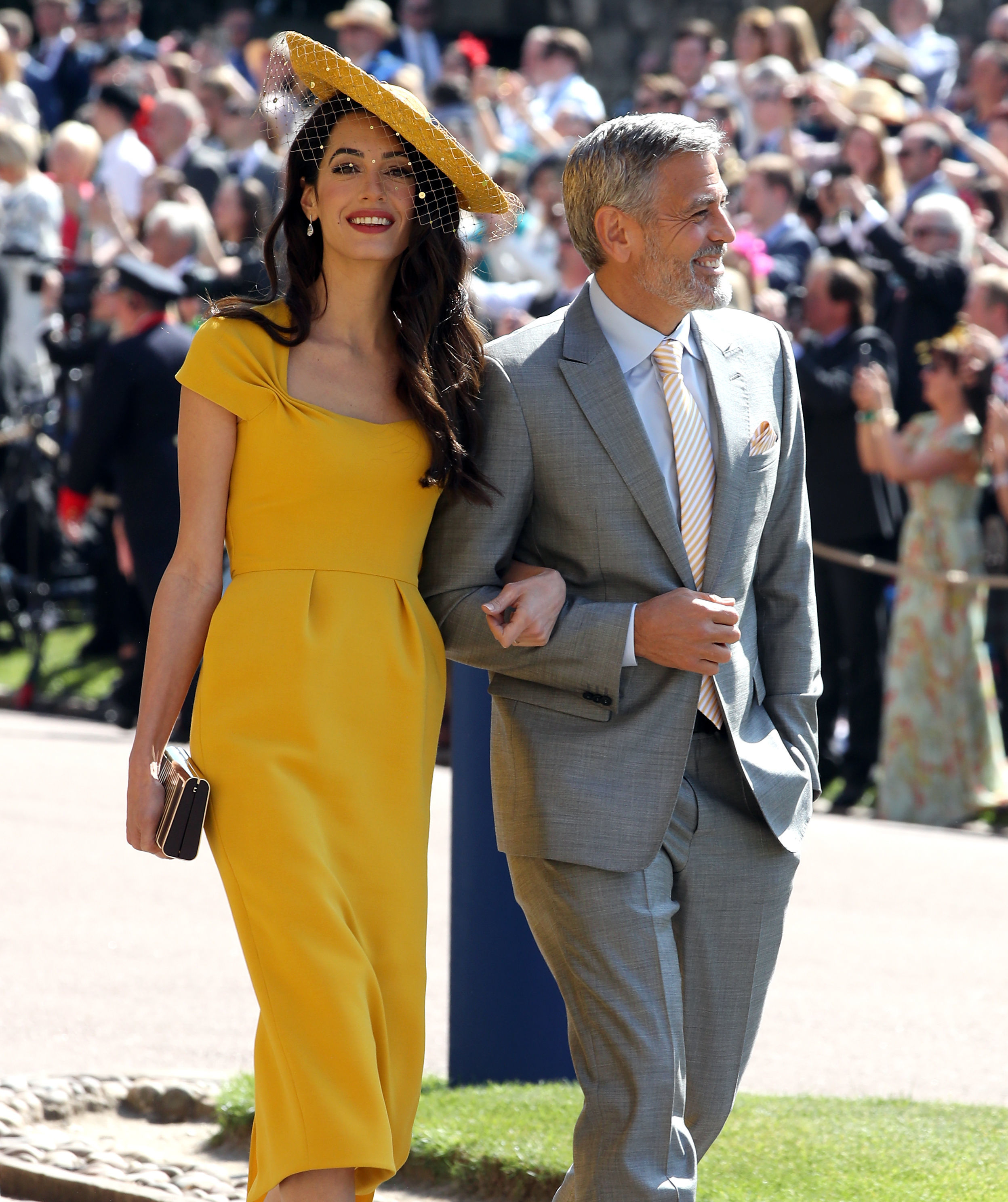 Amal Clooney and George Clooney in Windsor, England, on May 19, 2018 | Source: Getty Images
