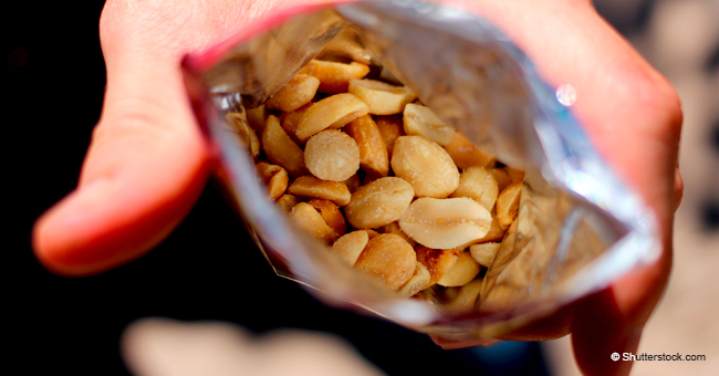 Young Man Helps Girlfriend's Father get a Peanut out of His Ear