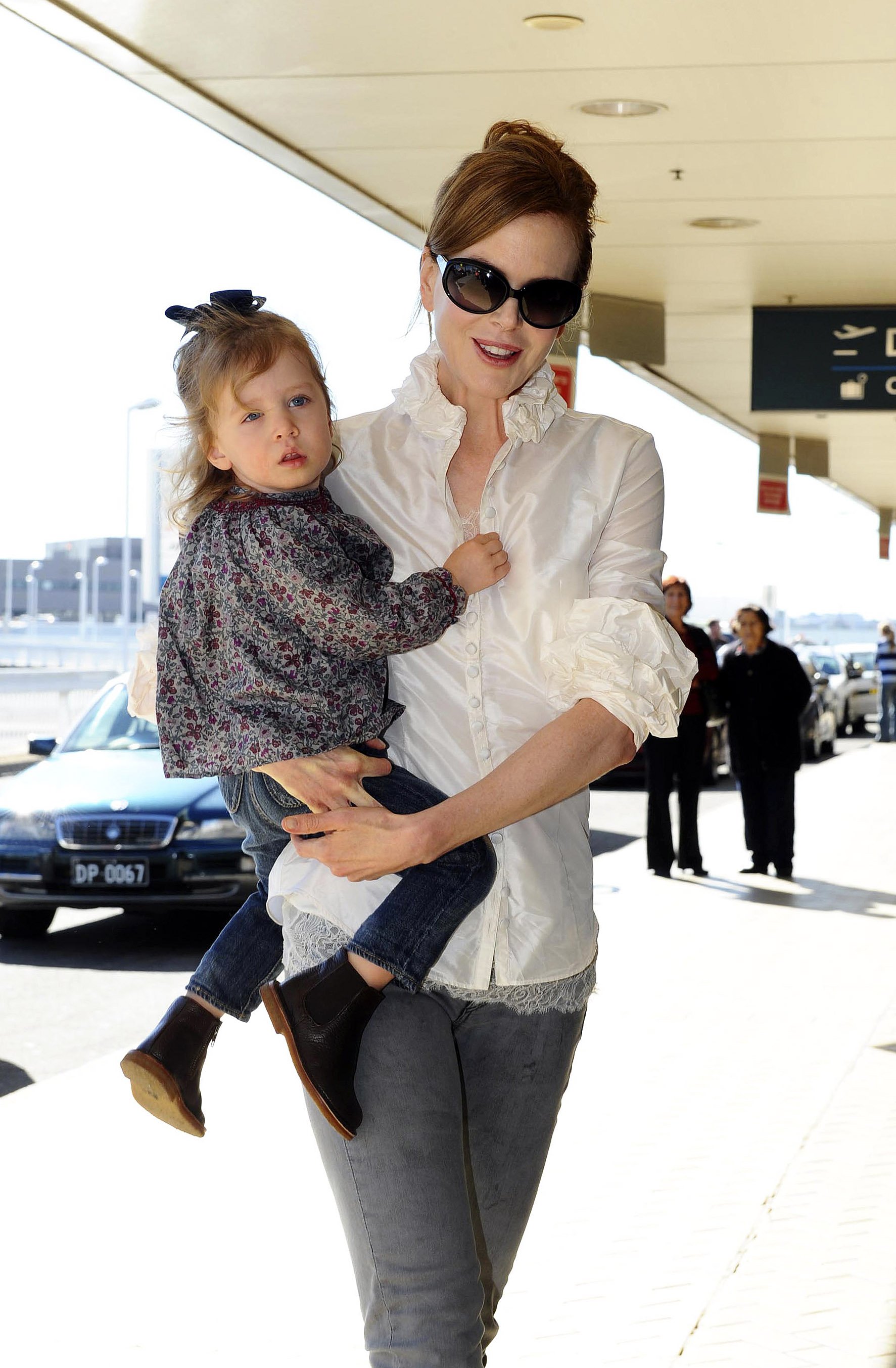 Australian actress Nicole Kidman and her daughter Sunday Rose arrive at Sydney airport to board a flight to Los Angeles on June 20, 2010 in Sydney, Australia. | Source: Getty Images