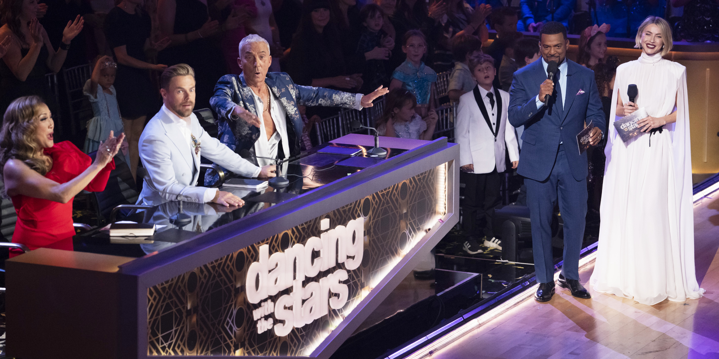 "DWTS" judges, Carrie Ann Inaba, Derek Hough, and Bruno Tonioli with Alfonso Ribeiro and Julianne Hough. | Source: Getty Images