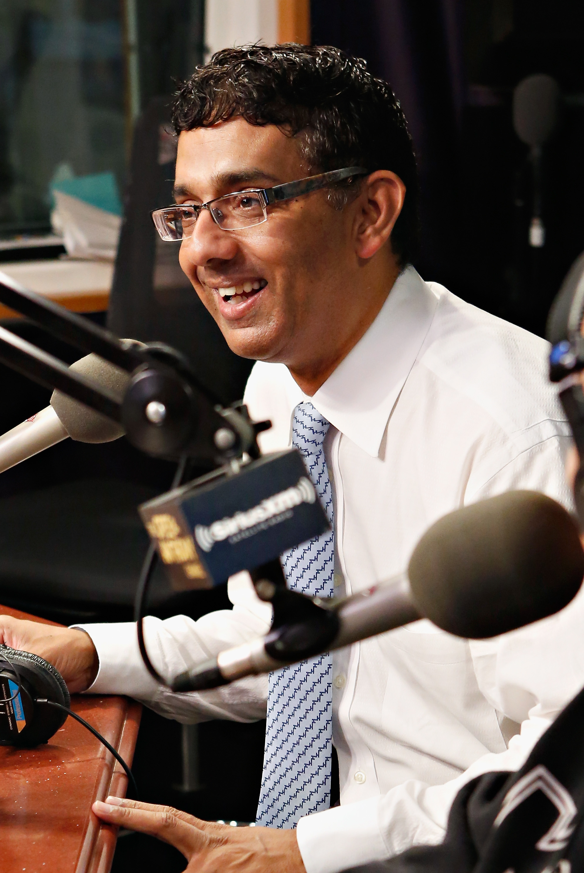 Dinesh D'Souza on "The Opie & Anthony Show" on September 27, 2012, in New York City. | Source: Getty Images