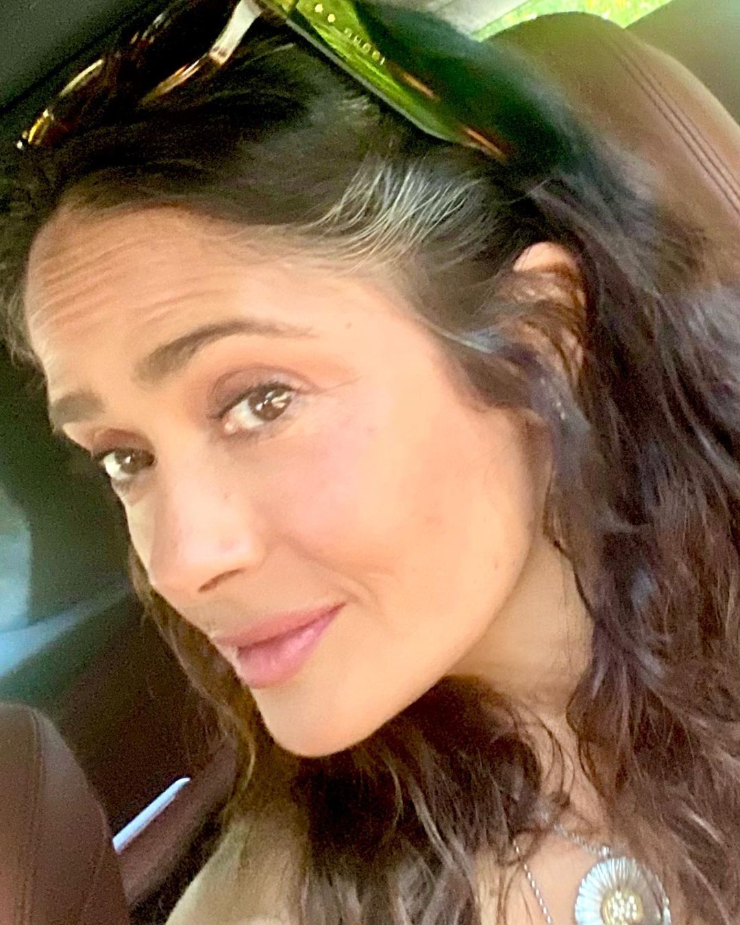 Salma Hayek shows off her graying hair, from an Instagram post, dated July 27, 2023 | Source: Instagram/salmahayek/