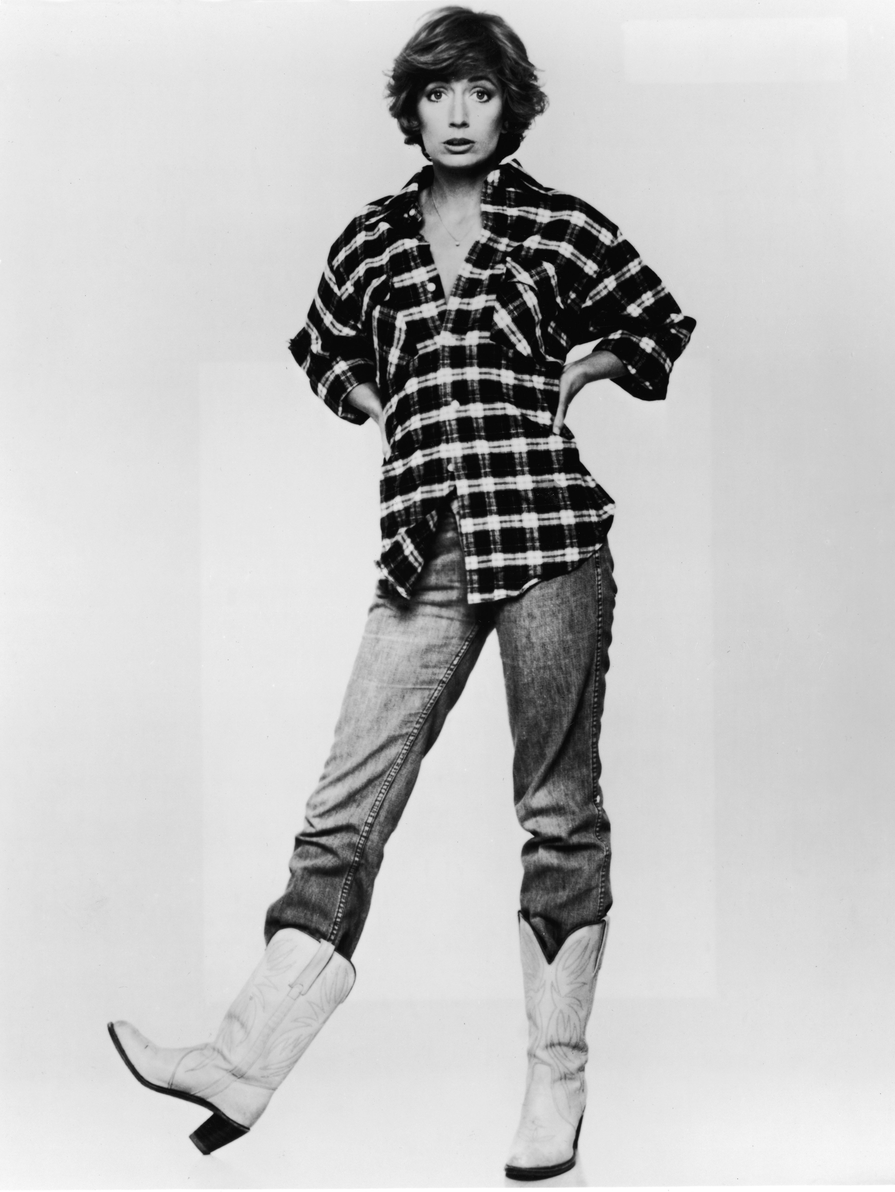 Full-length promotional studio portrait of American actor Penny Marshall wearing cowboy boots, 1970s | Source: Getty Images