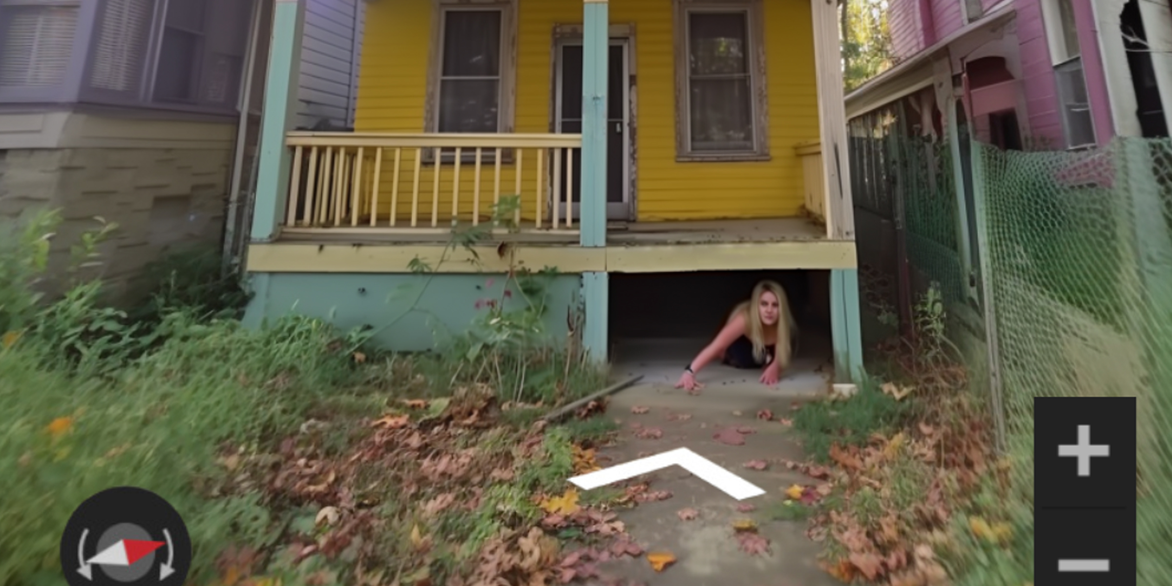 A woman crawling under a porch | Source: AmoMama