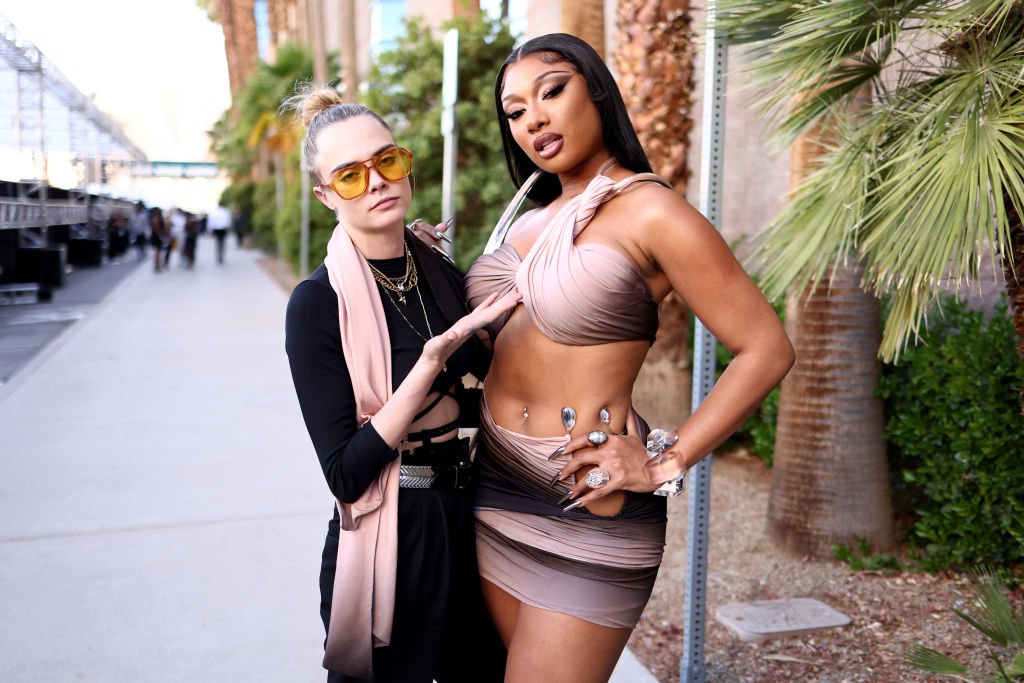 Cara Delevingne and Megan Thee Stallion during the 2022 Billboard Music Awards at MGM Grand Garden Arena on May 15, 2022 in Las Vegas, Nevada. | Source: Getty Images