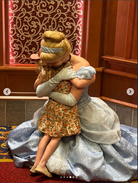 Princess Lilibet hugging Cinderella, from a post dated May 11, 2026 | Source: Instagram/meghan