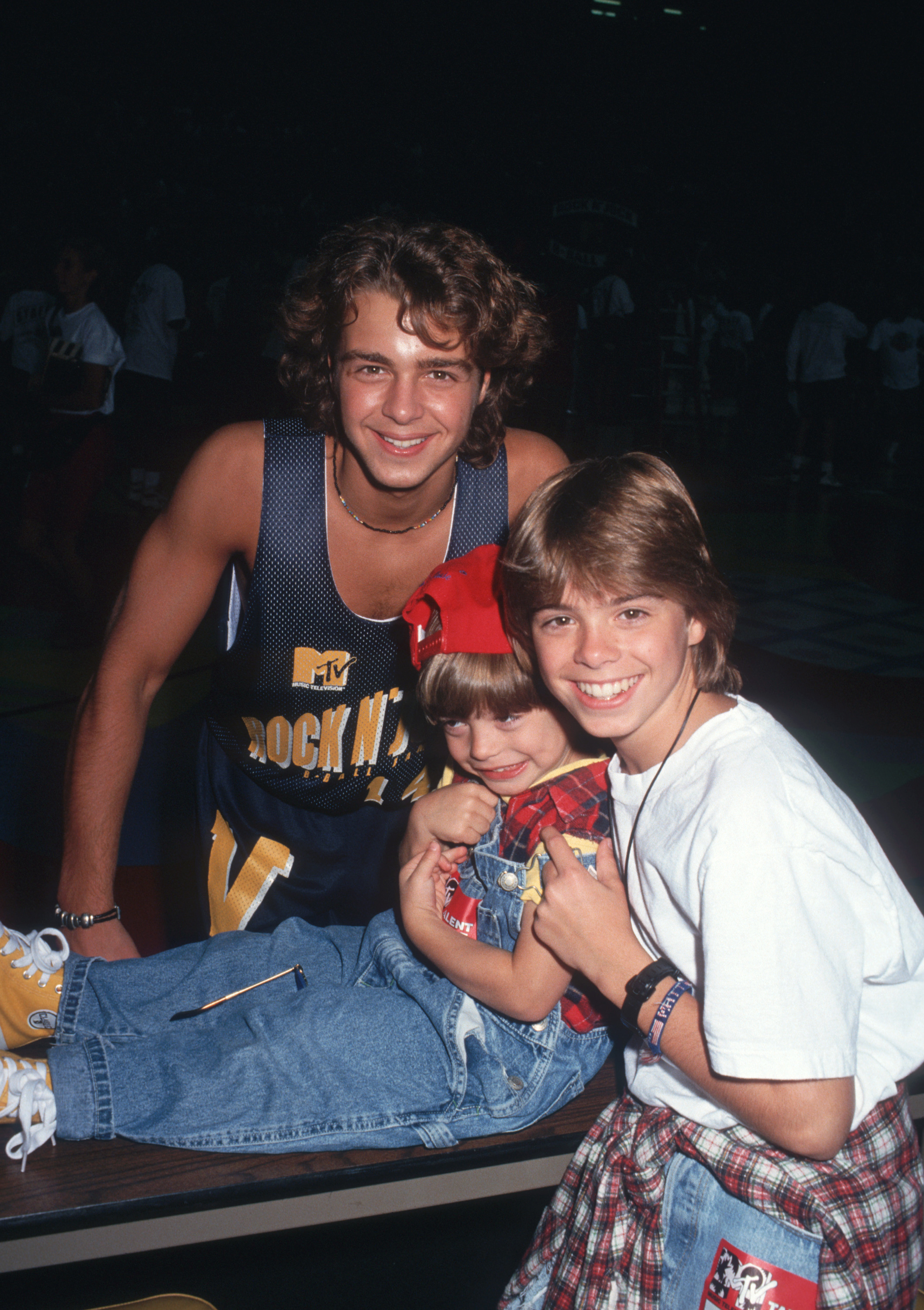 Joey, Andrew, and Matthew Lawrence spotted at the MTV Rock N' Jock B-Ball Pediatric AIDS Foundation event on September 20, 1992 | Source: Getty Images